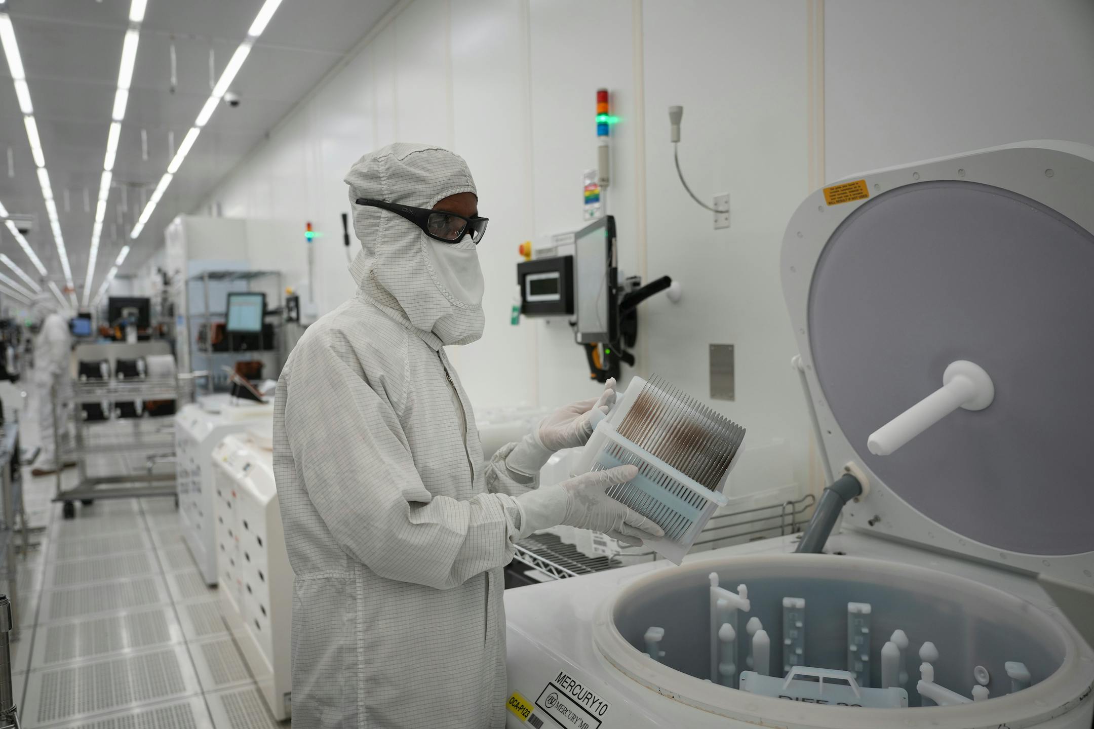 Polar Semiconductor employees work in one of three fabrication areas inside the company's expansive clean room.