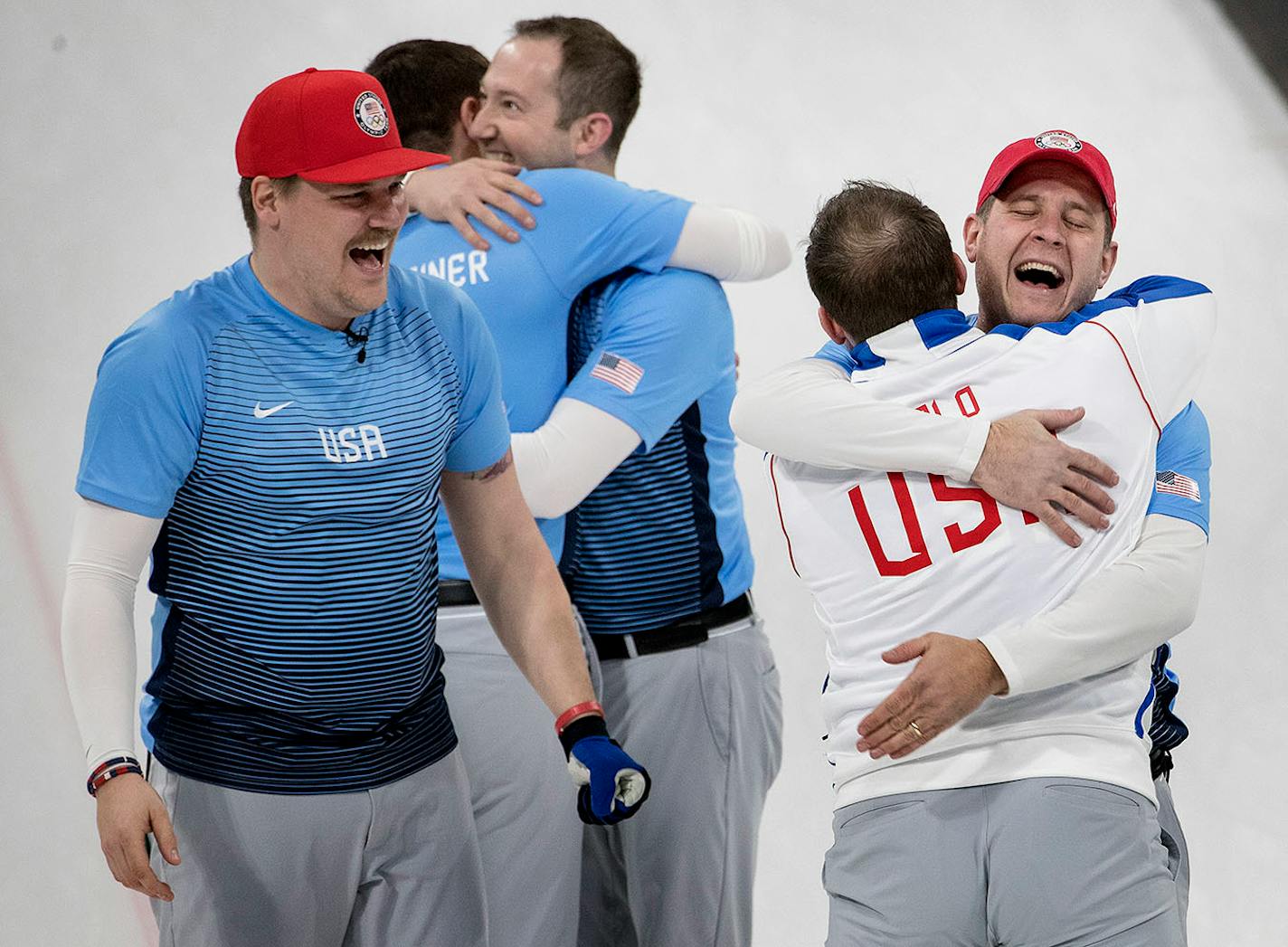 Team USA celebrates after a 10-7 win against Sweden during the gold-medal match on Saturday, Feb. 24, 2018, at the Pyeongchang Winter Olympics' Gangneung Curling Centre.