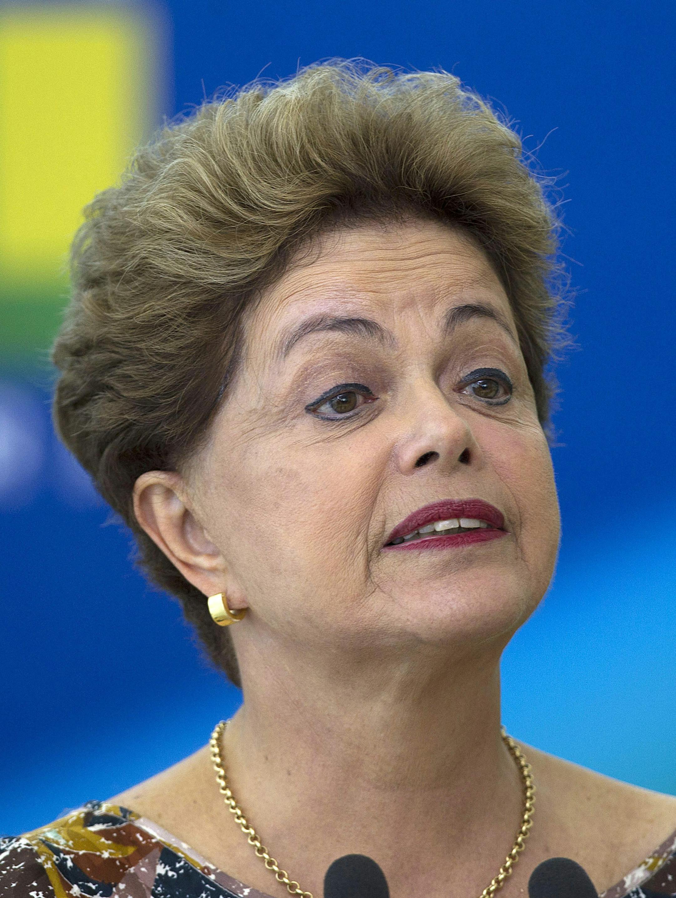 Brazil's President Dilma Rousseff speaks during a ceremony to renew the second term of Attorney General Rodrigo Janot at the Planalto Palace, in Brasilia, Brazil, Thursday, Sept. 17, 2015. Janot is leading the inquiry into the a Petrobras kickback scheme, the biggest corruption scandal yet uncovered in Brazil. (AP Photo/Joedson Alves)