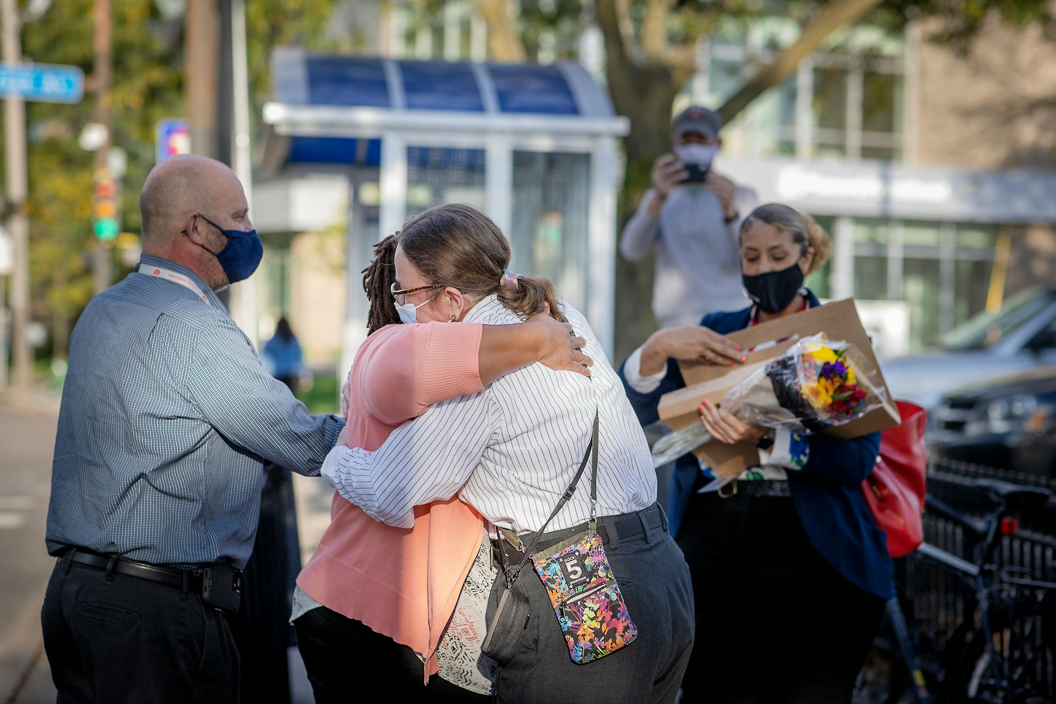 Transit employees greeted Melanie Benson with flowers and a plaque at one of her stops celebrating her anniversary, Monday, October 11, 2021 between Minneapolis and St. Paul.