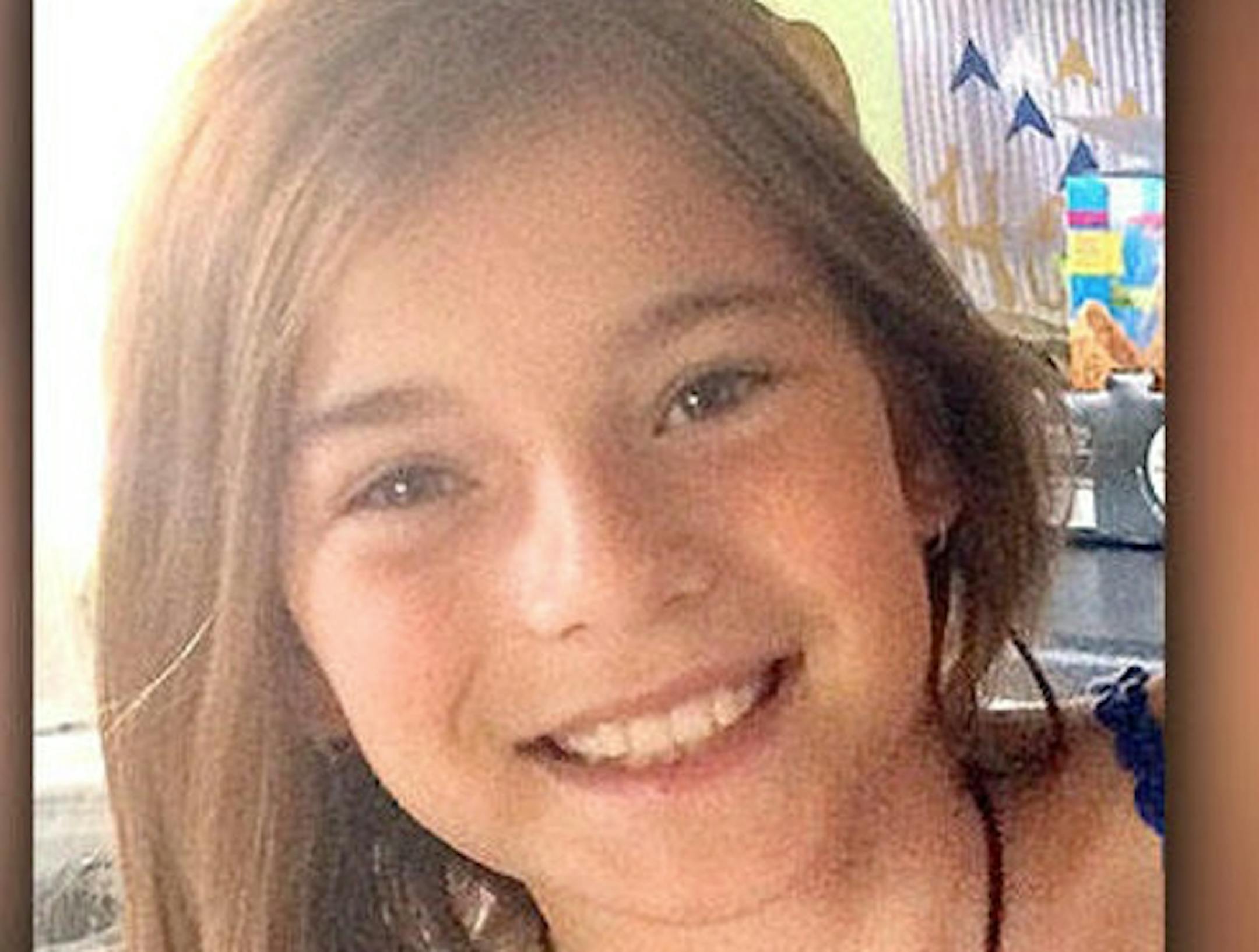 Maren Kesselhon, 11, was bitten while dangling from a paddle board on Island Lake north of Duluth.