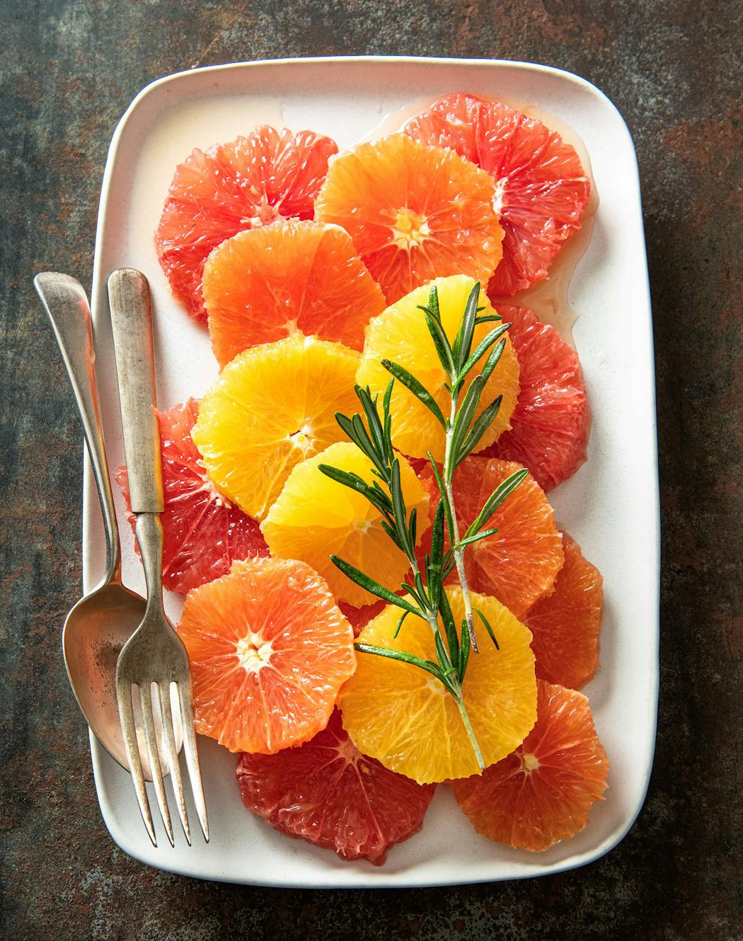 If time allows, prepare this salad a day ahead so the rosemary flavors infuse the fruit.