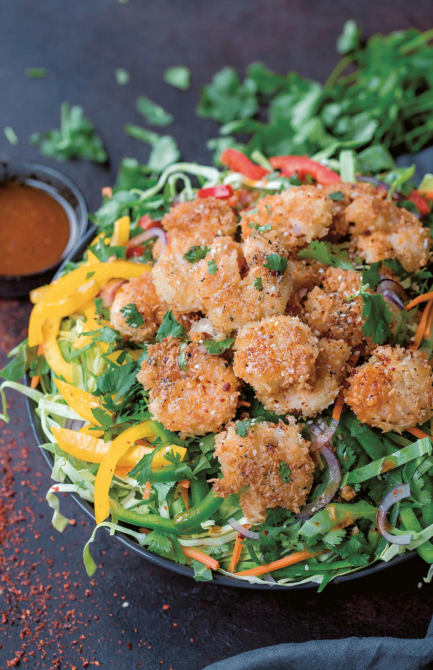 Coconut Shrimp Salad with Asian Slaw
Reprinted with permission from Seriously Good Salads by Nicky Corbishley, Page Street Publishing Co. 2019. Photo credit: Nicky Corbishley.