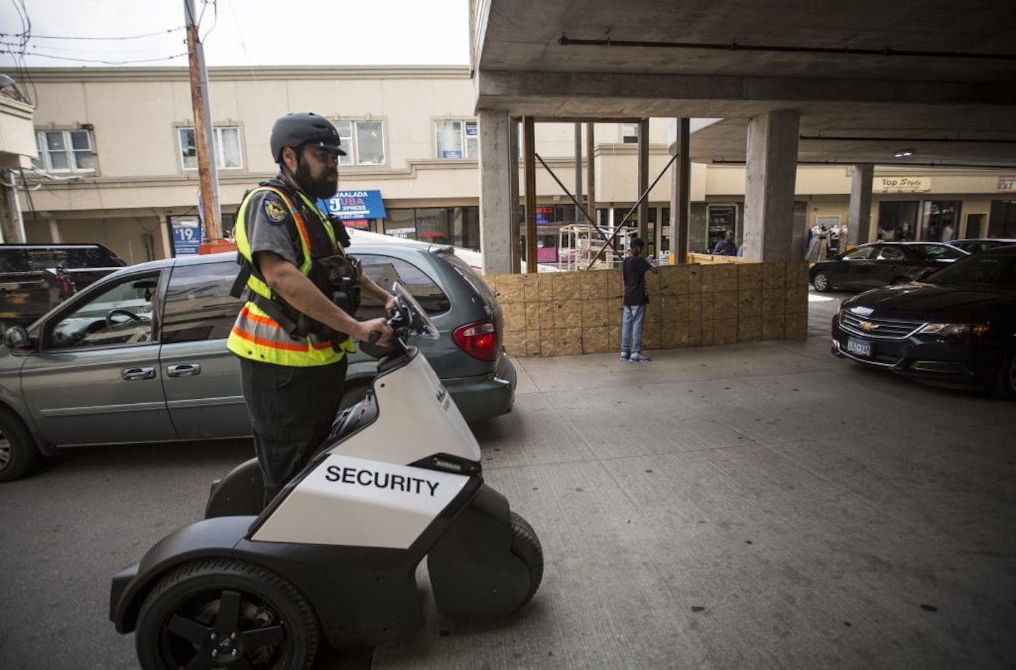 An armed security guard used a segway to patrol the Karmel Mall in Minneapolis, Minn., September 8, 2016.