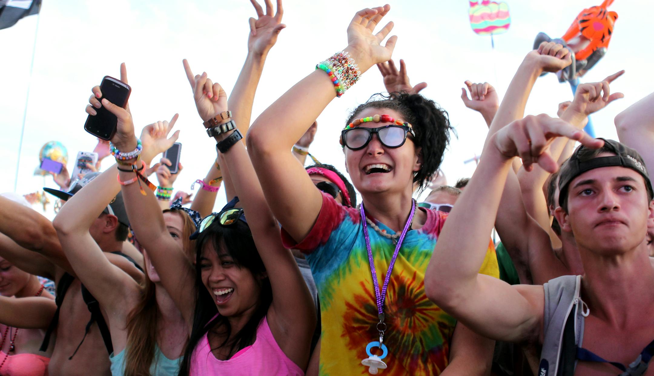 Sara Weber, wearing glasses, 22, of Green Bay, Wis., dances in the front row as Zedd performs on the main stage at the Summer Set Music & Camping Festival in Somerset, Wis., on Saturday, August 10, 2013. ] (ANNA REED/STAR TRIBUNE) anna.reed@startribune.com (cq)