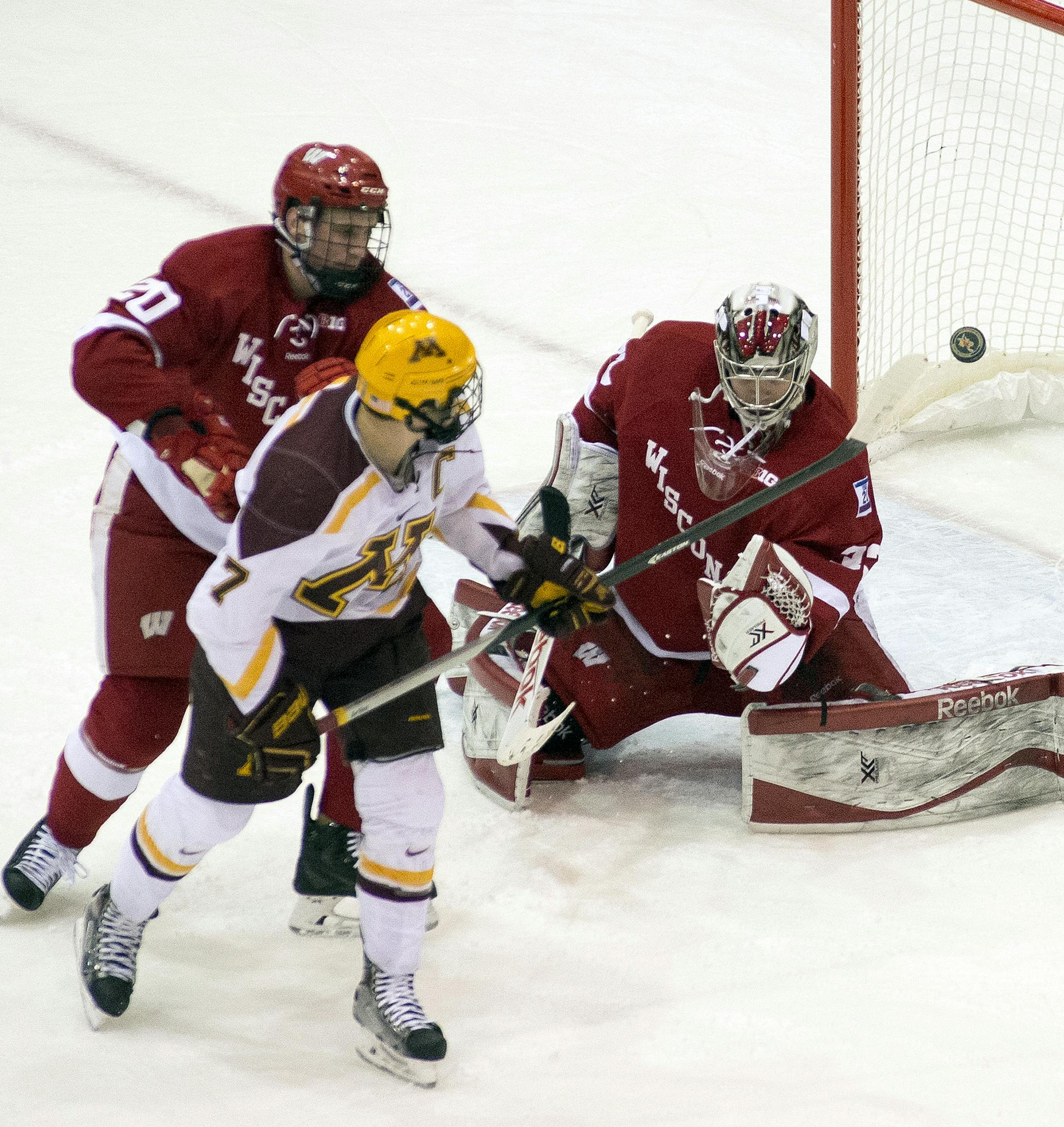 University of Minnesota left wing Kyle Rau (7) nearly gets gets a goal against University of Wisconsin goalie Joel Rumpel (33) during the first period. ] (Aaron Lavinsky | StarTribune) The University of Minnesota Gophers hockey team plays against the Wisconsin Badgers on Friday, Jan. 16, 2015 at Mariucci Arena.