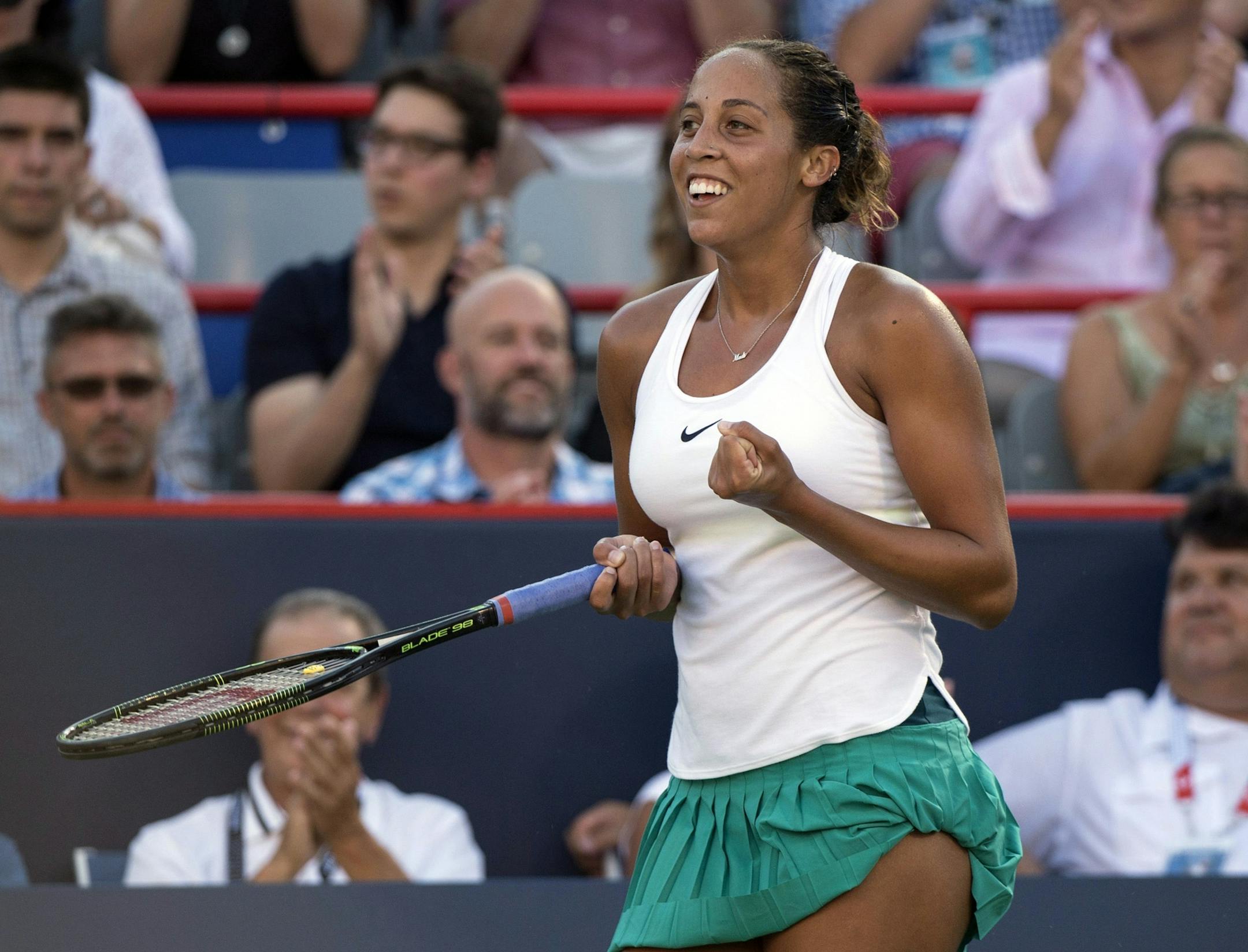Madison Keys celebrates her victory over Kristina Kucova, of Slovakia, in a semifinal at the Rogers Cup tennis tournament Saturday, July 30, 2016, in Montreal. (Paul Chiasson/The Canadian Press via AP)