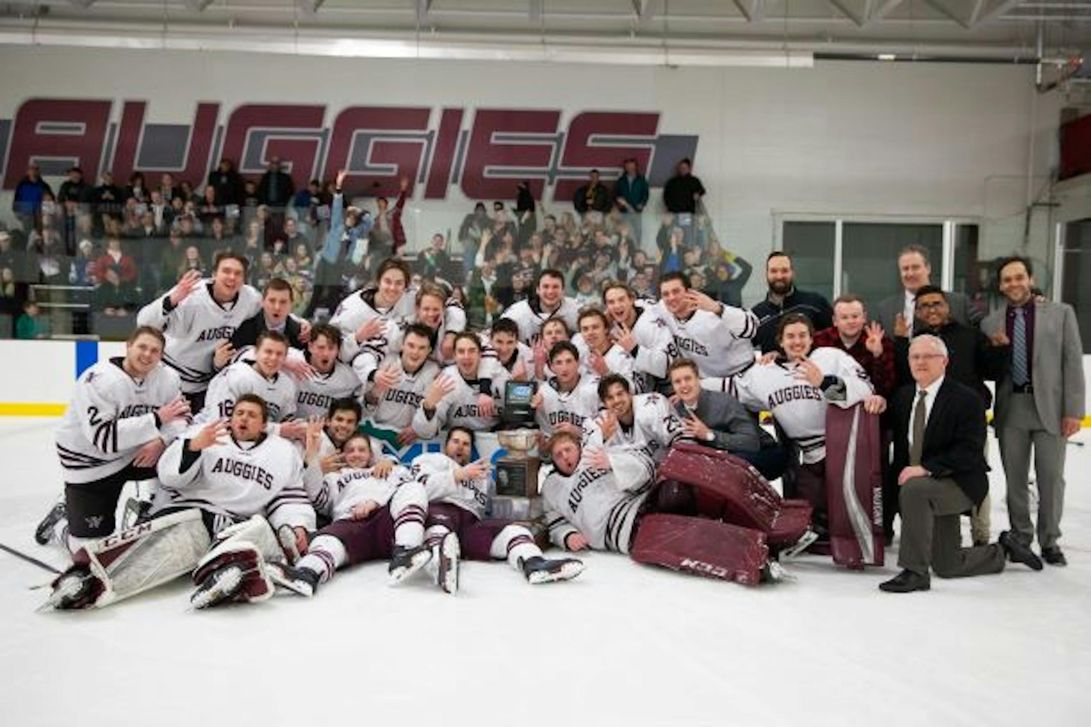 Augsburg players celebrated therir MIAC tournament championship.