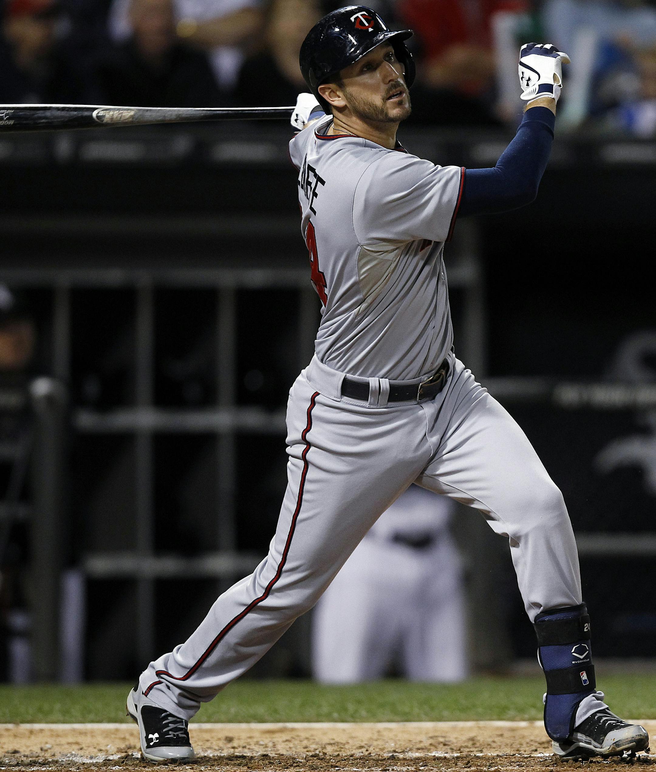 Minnesota Twins' Trevor Plouffe hits an RBI double against the Chicago White Sox during the third inning of a baseball game Tuesday, Sept. 17, 2013, in Chicago. (AP Photo/Andrew A. Nelles)