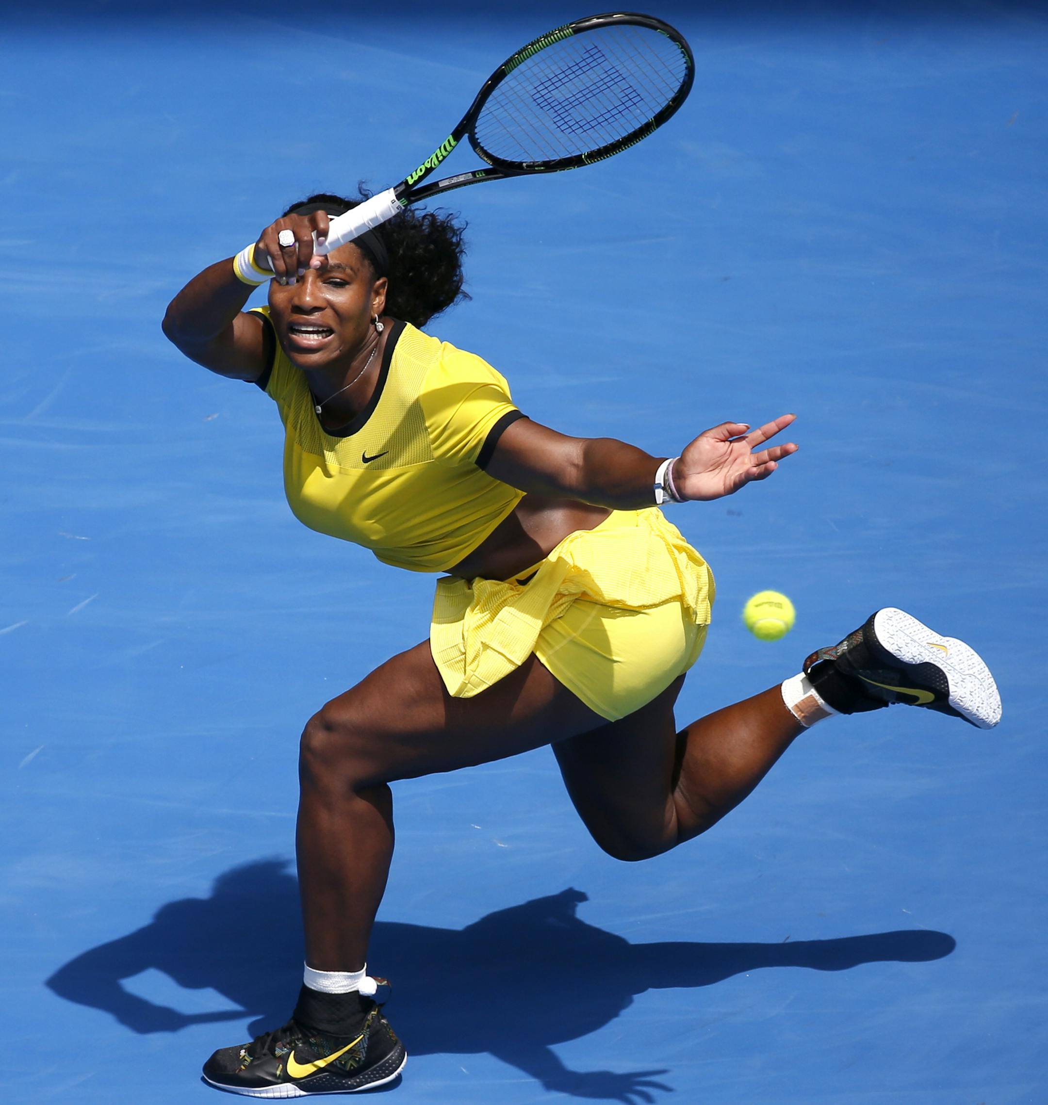 Serena Williams of the United States plays a forehand return to Maria Sharapova of Russia during their quarterfinal match at the Australian Open tennis championships in Melbourne, Australia, Tuesday, Jan. 26, 2016.(AP Photo/Vincent Thian)