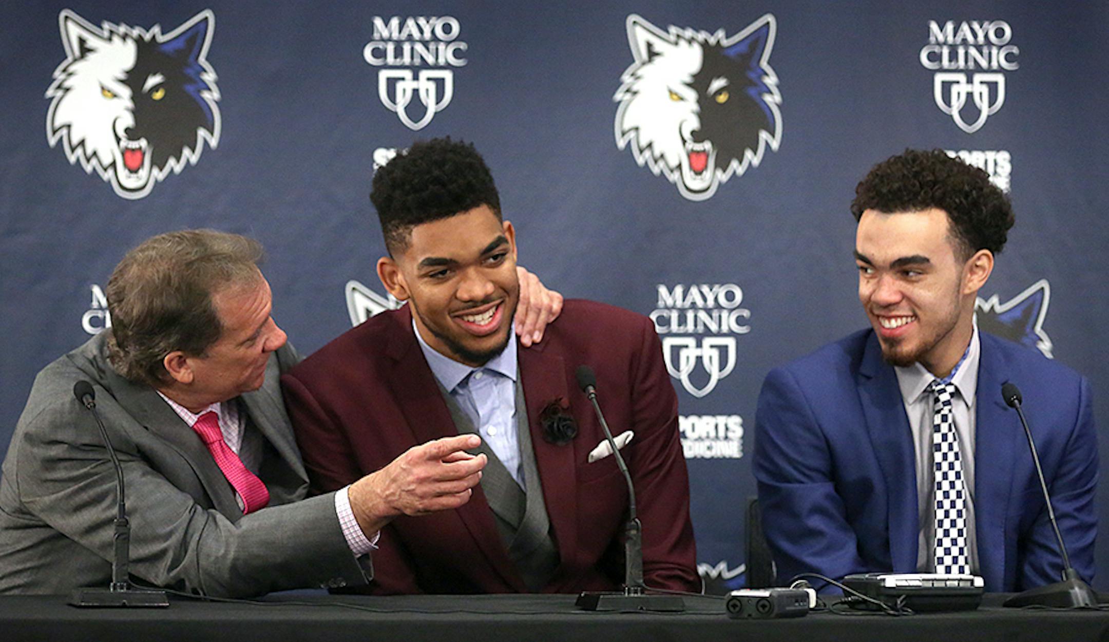 Karl-Anthony Towns (second from left) and Tyus Jones shared a light moment with Wolves head coach Flip Saunders during a news conference on June 26, 2015.