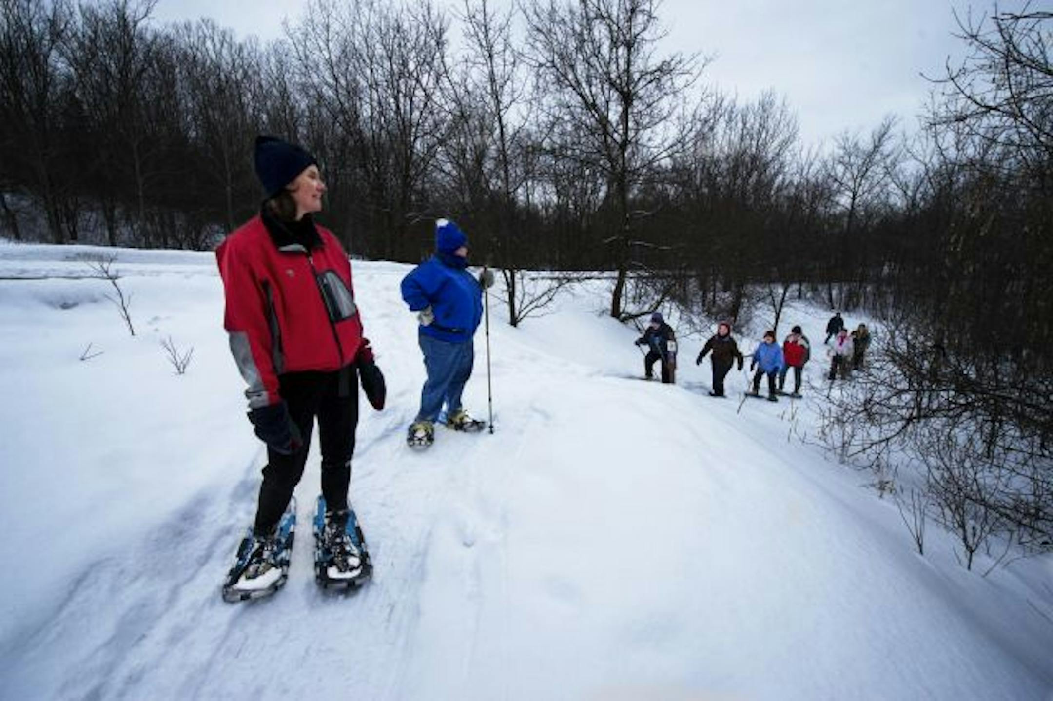 Ann Schinas, a Three Rivers Park recreation specialist, led the Green Fit Club in snowshoeing on a trail at French Regional Park in Plymouth last March.