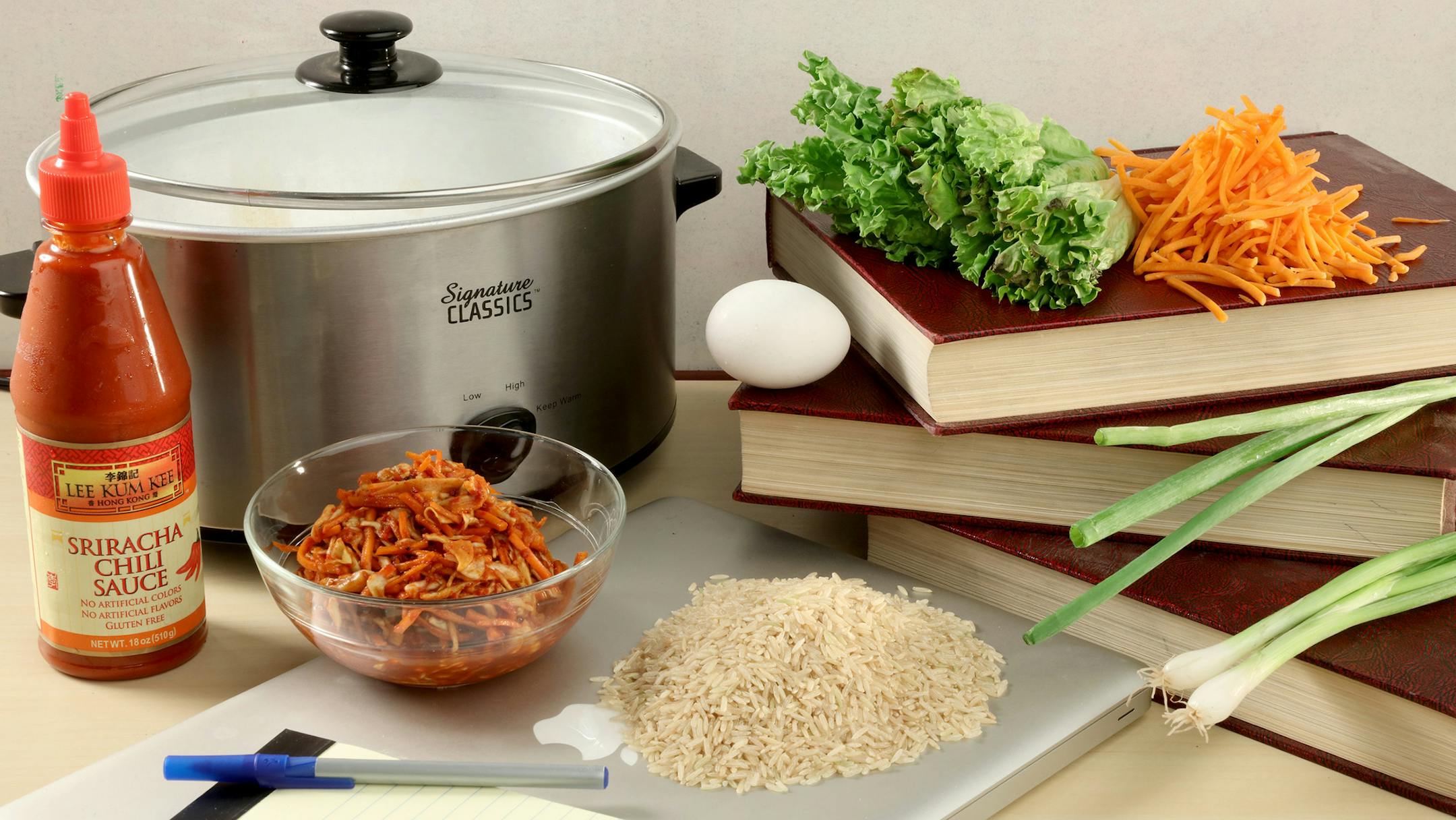 The ingredients for a slow cooker bibimbap are easy to come by: chili sauce, vegetables, kimchee and an egg. (Michael Tercha/Chicago Tribune/TNS)