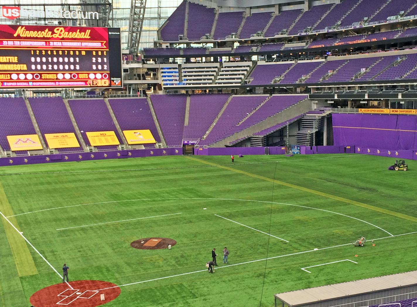 Workers prepare U.S. Bank Stadium for its first-ever baseball action on Feb. 23, 2017.