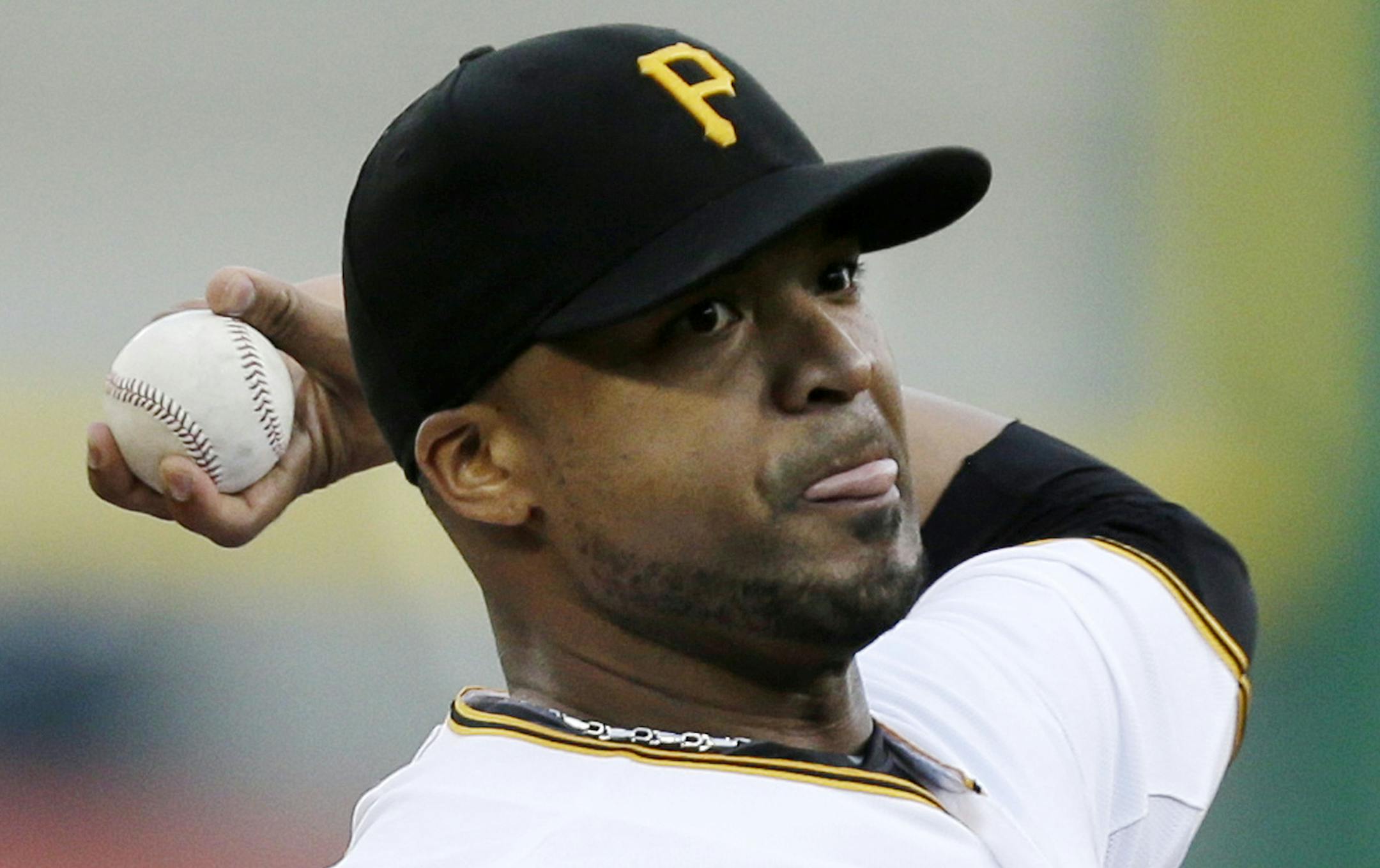 Pittsburgh Pirates starting pitcher Francisco Liriano delivers during the first inning of a baseball game against the St. Louis Cardinals in Pittsburgh Monday, July 29, 2013. (AP Photo/Gene J. Puskar)