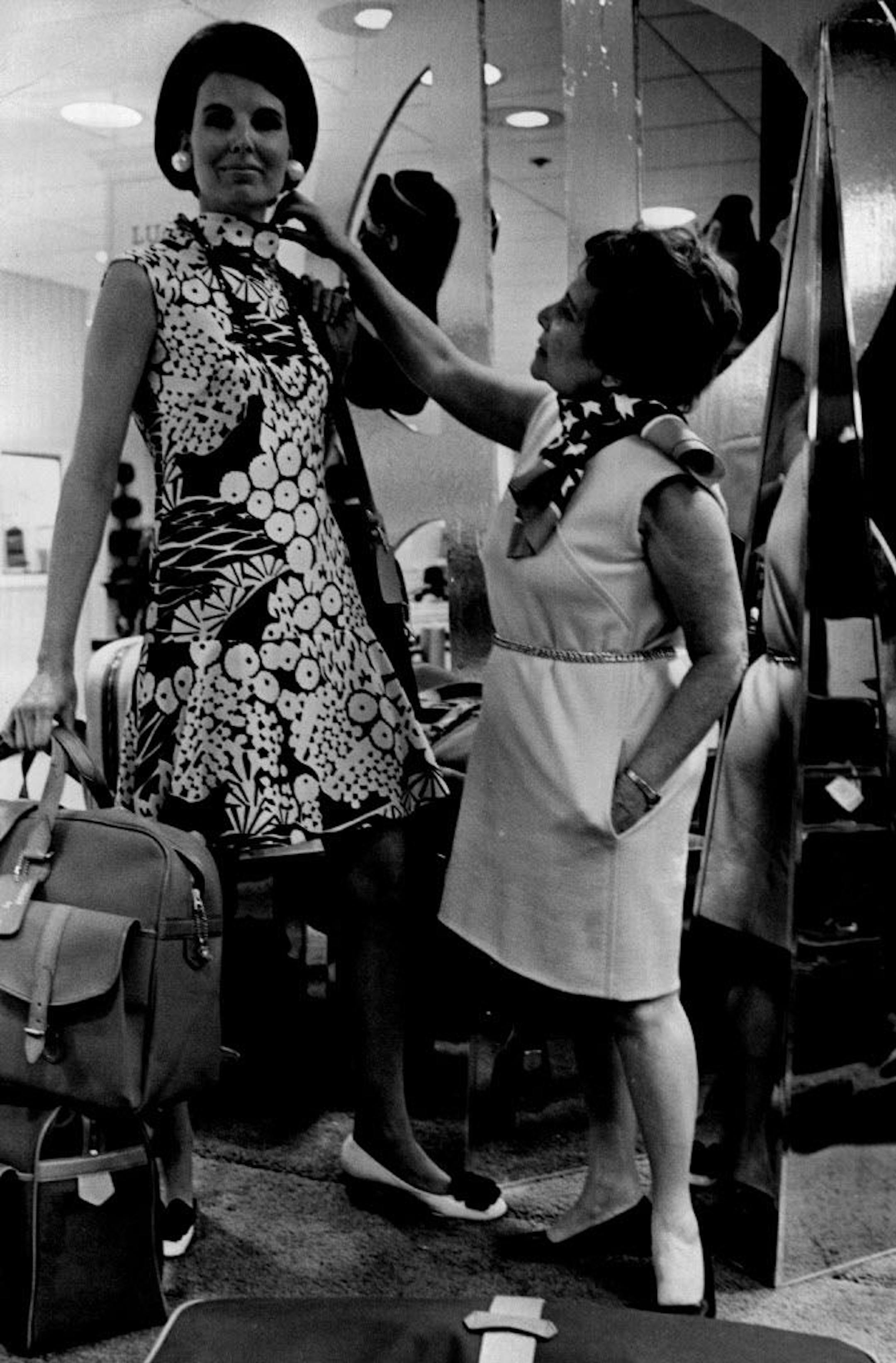 Dayton's Oval Room in 1969: Fashion designer Adele Simpson was in Minneapolis Tuesday to show 80 pieces from her spring and summer collection to buyers at Dayton's Oval Room. Above, the 72-year-old Miss Simpson made an adjustment on one of her dresses on a model.