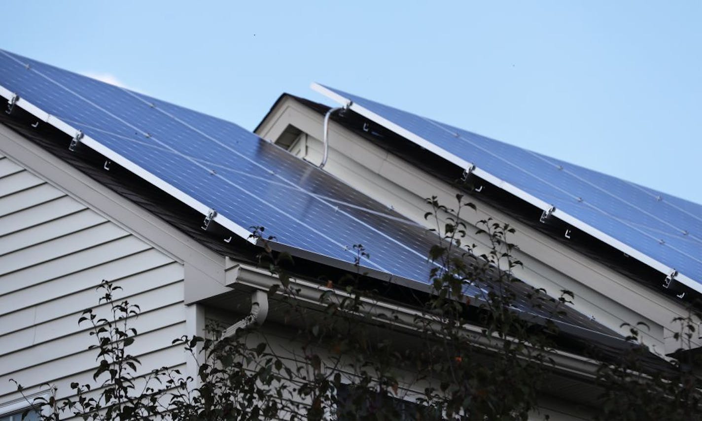 Solar panels with South side exposure charge the two Tesla batteries int he garage.