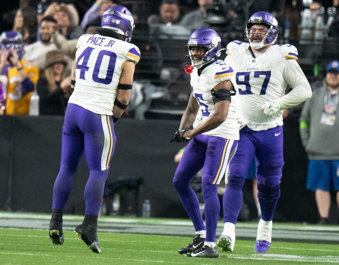 Minnesota Vikings linebacker Ivan Pace Jr. (40) celebrated his fourth quarter interception with cornerback Mekhi Blackmon (5), and efensive tackle Harrison Phillips (97) Sunday December ,10 ,2023 in,Las Vegas, Nev. ] JERRY HOLT • jerry.holt@startribune.com