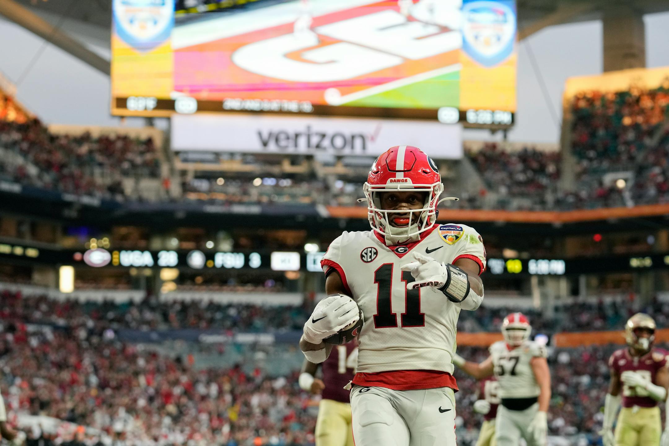 Georgia wide receiver Arian Smith points after scoring a touchdown against Florida State in the first half of the Orange Bowl