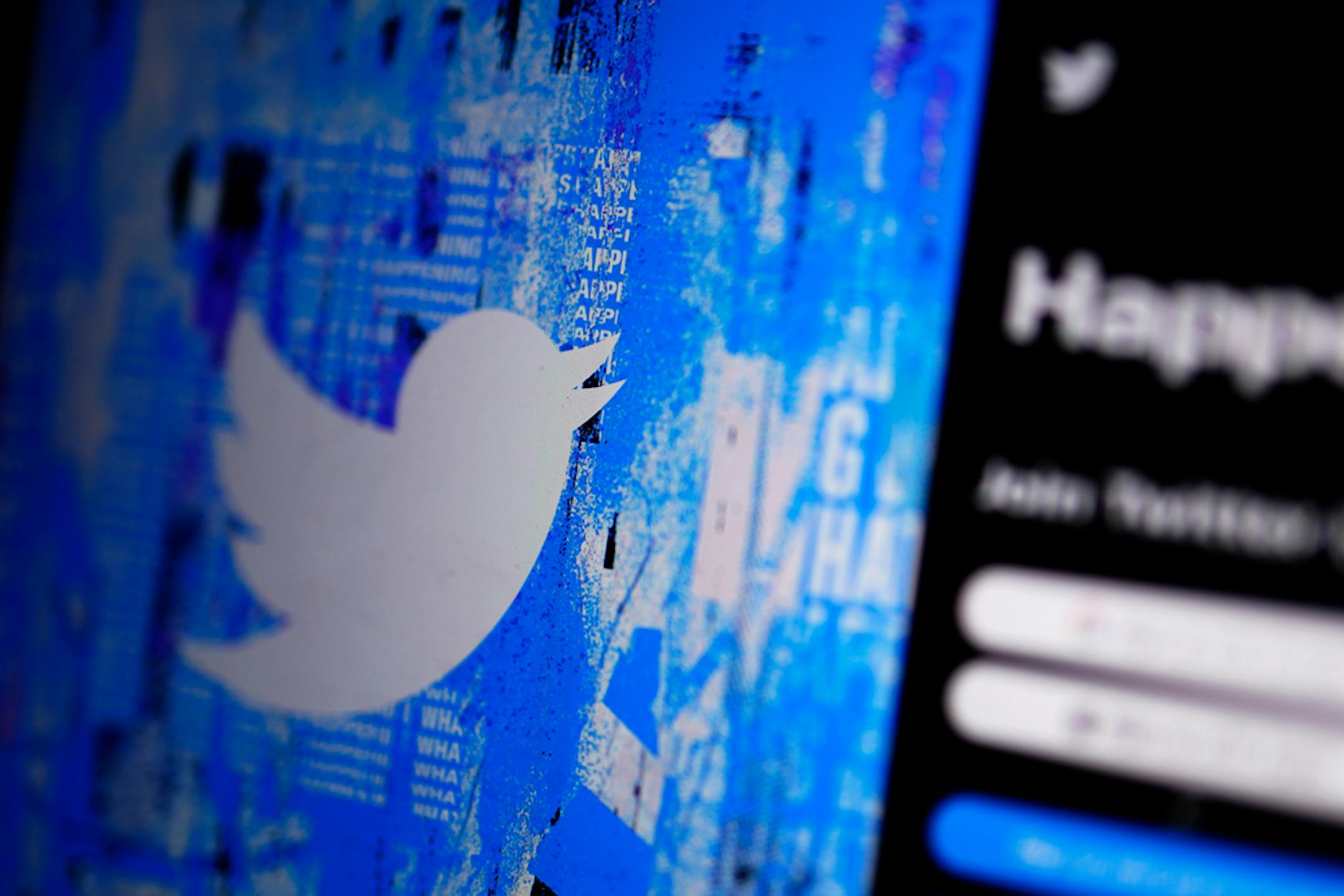 FILE - The Twitter splash page is seen on a digital device, Monday, April 25, 2022, in San Diego. On Thursday, Nov. 17, 2022, Twitter continued to bleed engineers and other workers after new owner Elon Musk gave them a choice to pledge to "hardcore" work or resign with severance pay. (AP Photo/Gregory Bull, File)