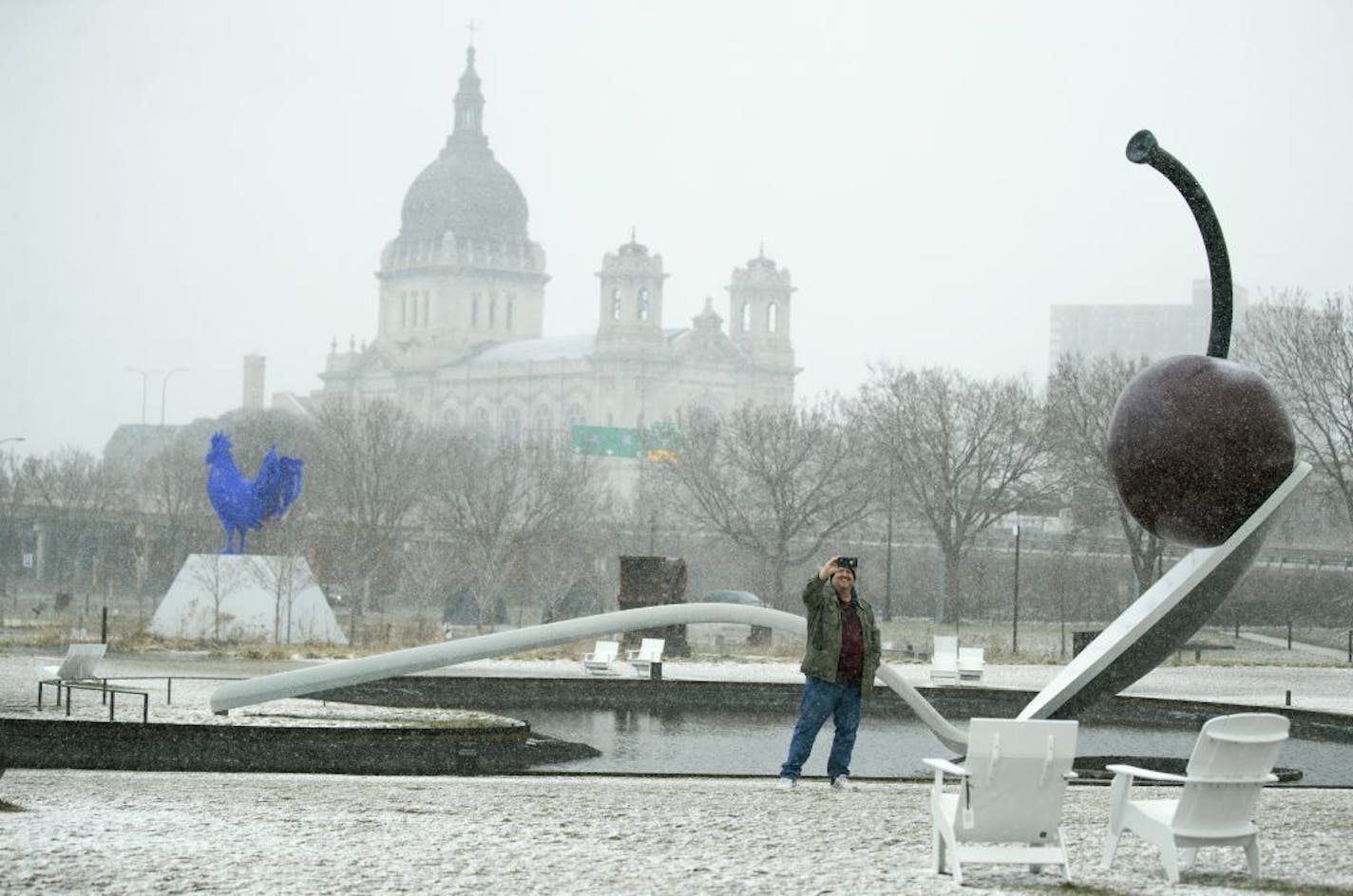 Matthew McNeil of Hopkins took selfie in the Walker Art Center sculpture garden as snow fell in Minneapolis Sunday April 12, 2020 .