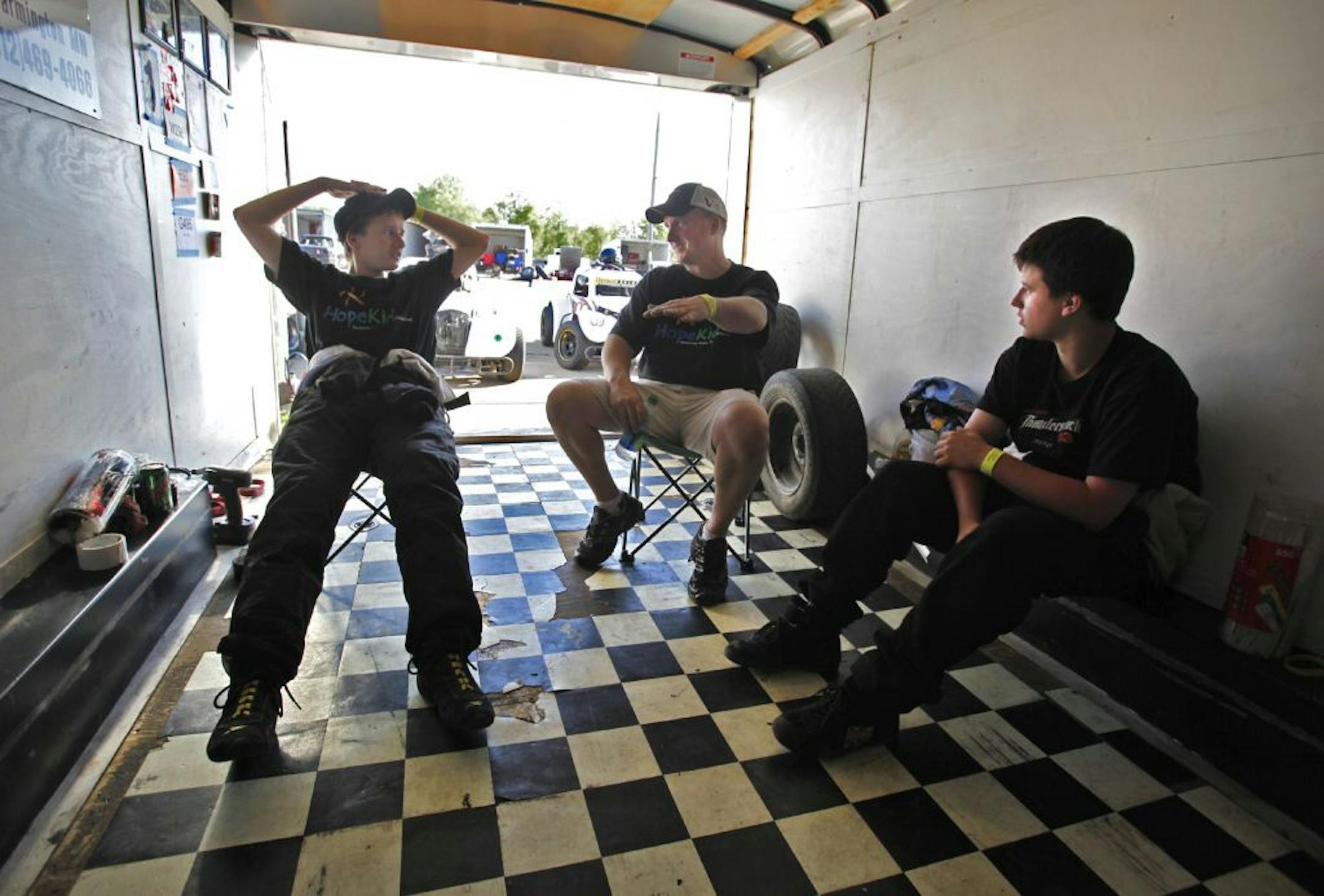 Dan Ostdiek schooled Michael, left, and Matthew, right, last month at Elko Speedway. Dan's father, John, owned Elko from 1978 to 1991.