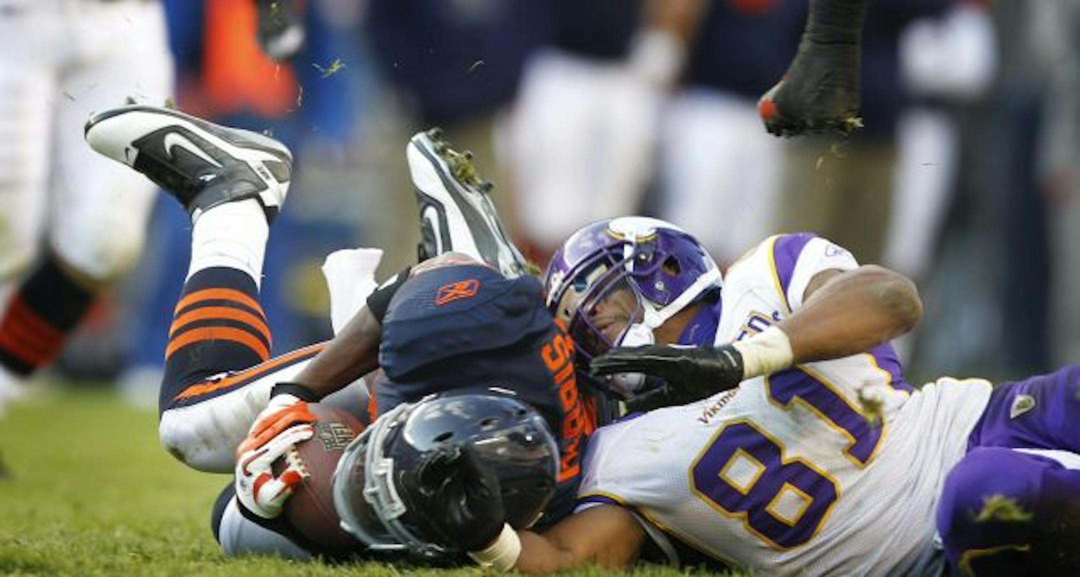 Chicago safety Chris Harris intercepted a fourth-quarter pass intended for Vikings tight end Visanthe Shiancoe .