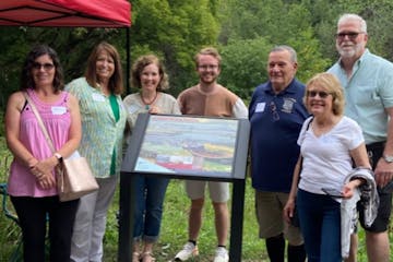 Connemara Patch descendants gathered around the sign in Swede Hollow Park at the August dedication. From left: Jean Flaherty, Sherry Munyon, Leslie Th