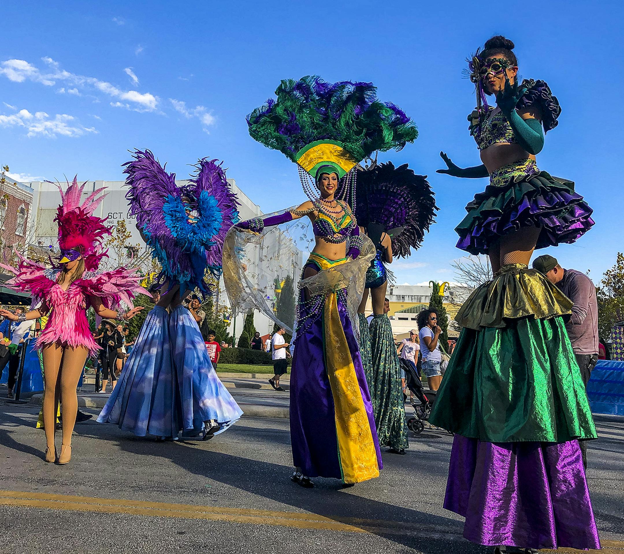 Performers dance in the streets of Universal Studios during Universal's Mardi Gras celebration on February 22, 2019. (Patrick Connolly/Orlando Sentinel/TNS)