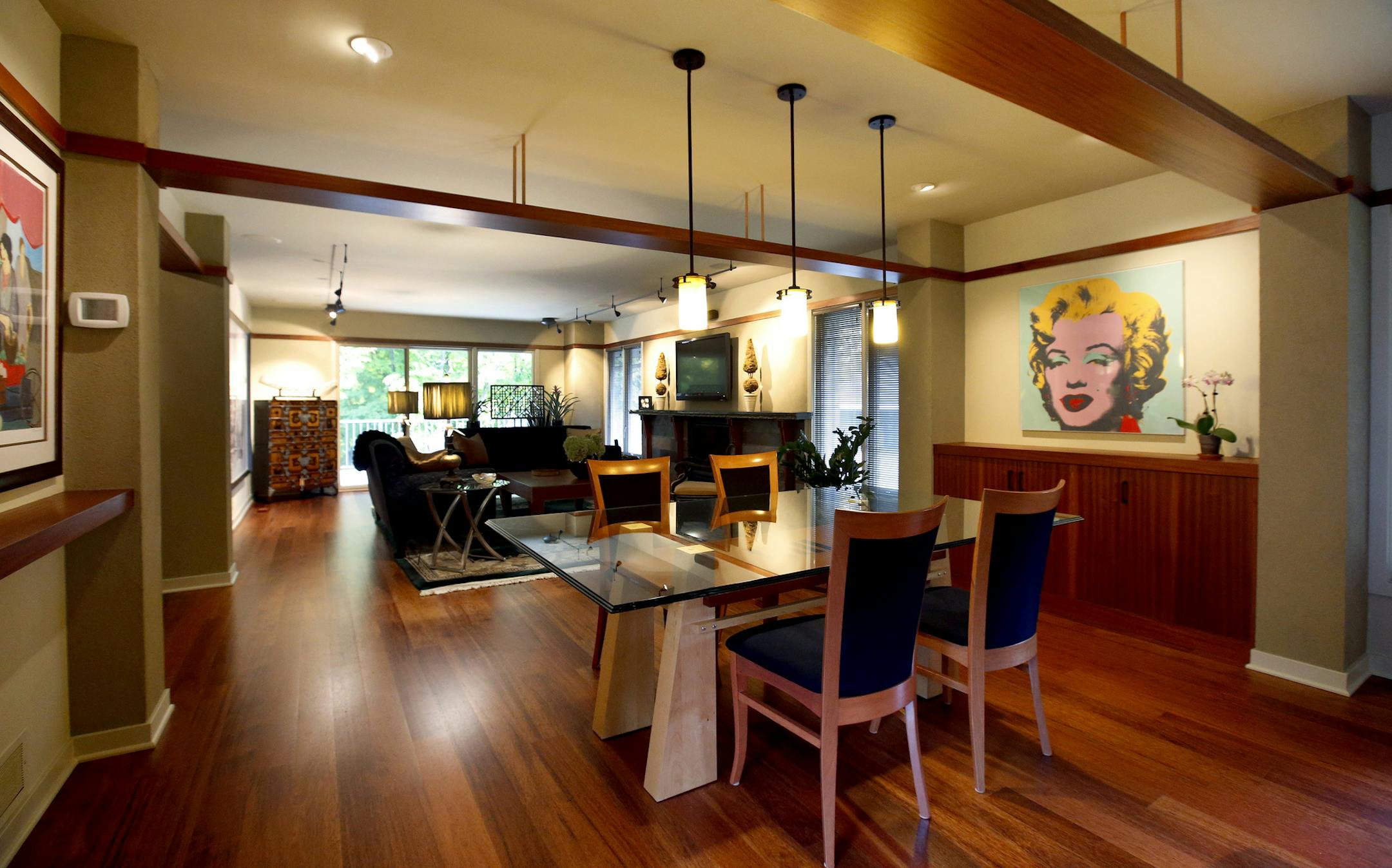 ] CARLOS GONZALEZ cgonzalez@startribune.com October 10, 2013, Shorewood, Minn., Sherry O'Donnell's 1970s townhome was stuck in a time warp. A whole house makeover gave it a warm 2010s aesthetic. Homeowners Sherry O'Donnell and Gary Johnson give a tour of their remodeled home.