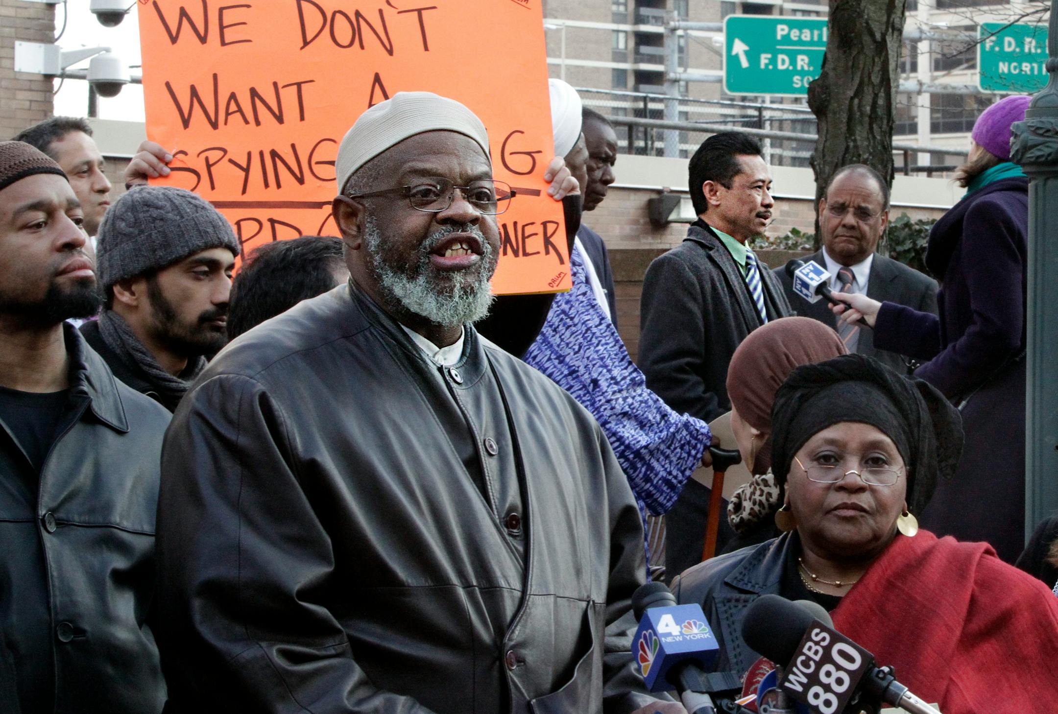 Imam Hajj Talib Abdur Rashid, fourth from left, of the Mosque of the Islamic Brotherhood of New York, speaks for a group of Muslim leaders excluded from a meeting with New York City Police Commissioner Raymond Kelly in March 2012 on the police surveillance of Muslim communities across the Northeast, spoke separately to reporters nearby.