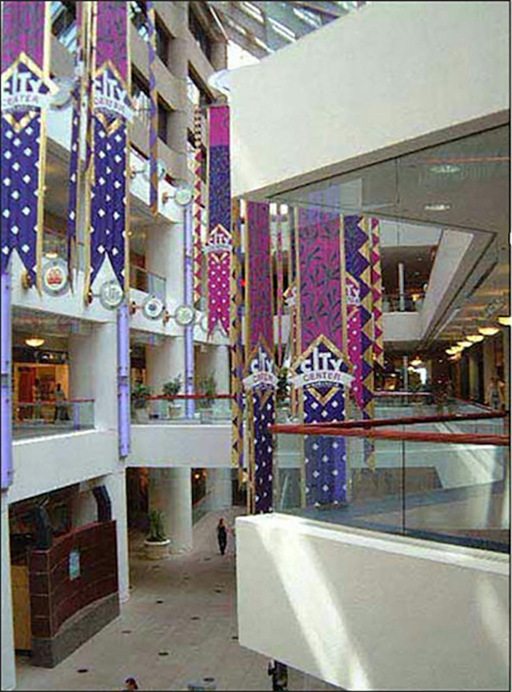 City Center in the 2000s,  decked out in some desperately garish banners. It doesn’t have to look like this to get people back, but some color would be nice. 