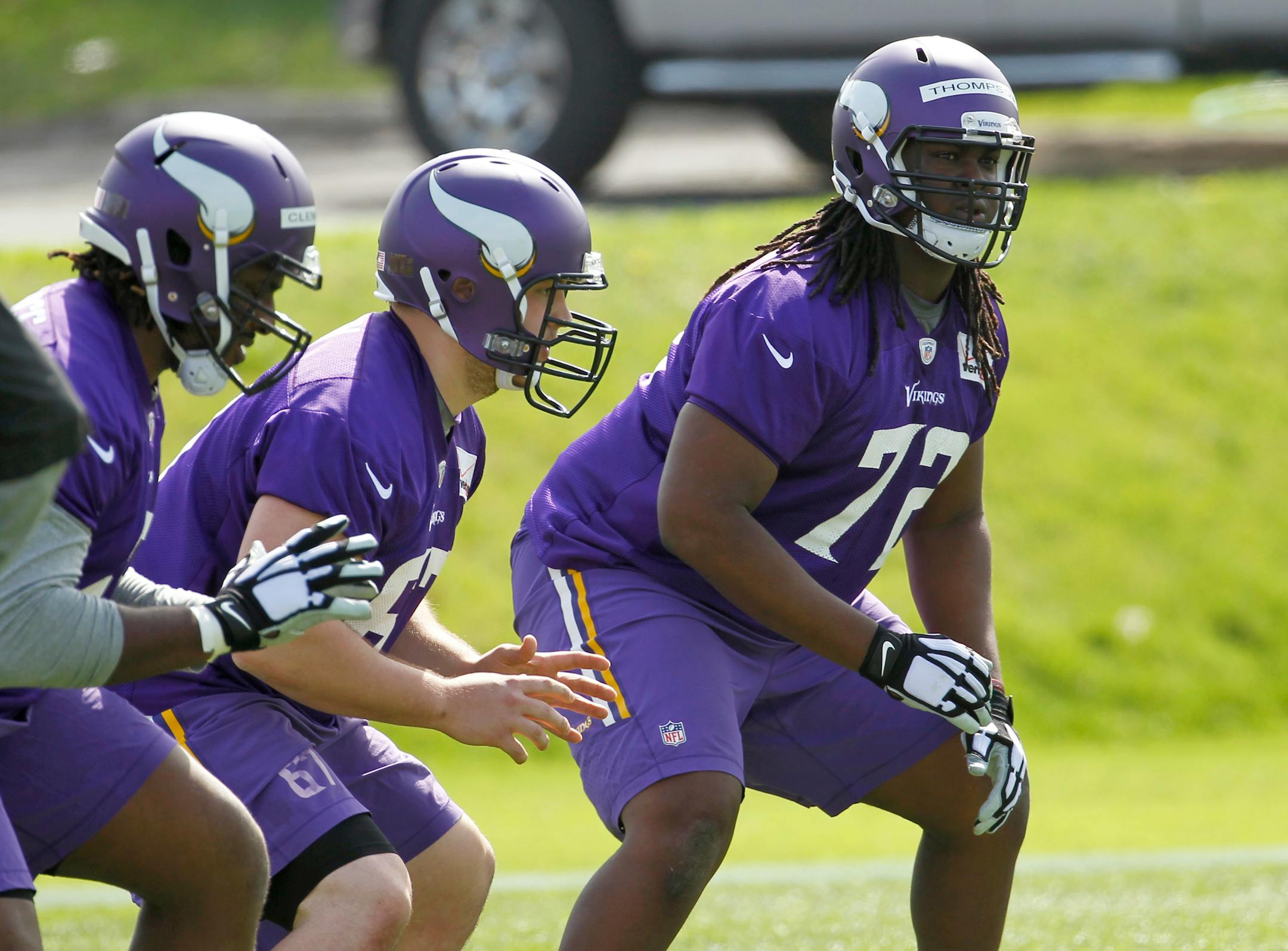 Minnesota Vikings tackle Tyrus Thompson, right, takes part in a drill during NFL football rookie minicamp in Eden Prairie, Minn., Friday, May 8, 2015. (AP Photo/Ann Heisenfelt)