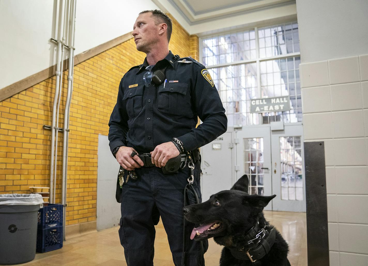 K9 guard Dennis Zahn stands guard as members of the Minnesota House of Representatives Corrections Subcommittee and the media tour the Minnesota Correctional Facility in Stillwater. ] LEILA NAVIDI &#xa5; leila.navidi@startribune.com BACKGROUND INFORMATION: Members of the Minnesota House of Representatives Corrections Subcommittee tour the Minnesota Correctional Facility in Stillwater on Friday, January 25, 2019.