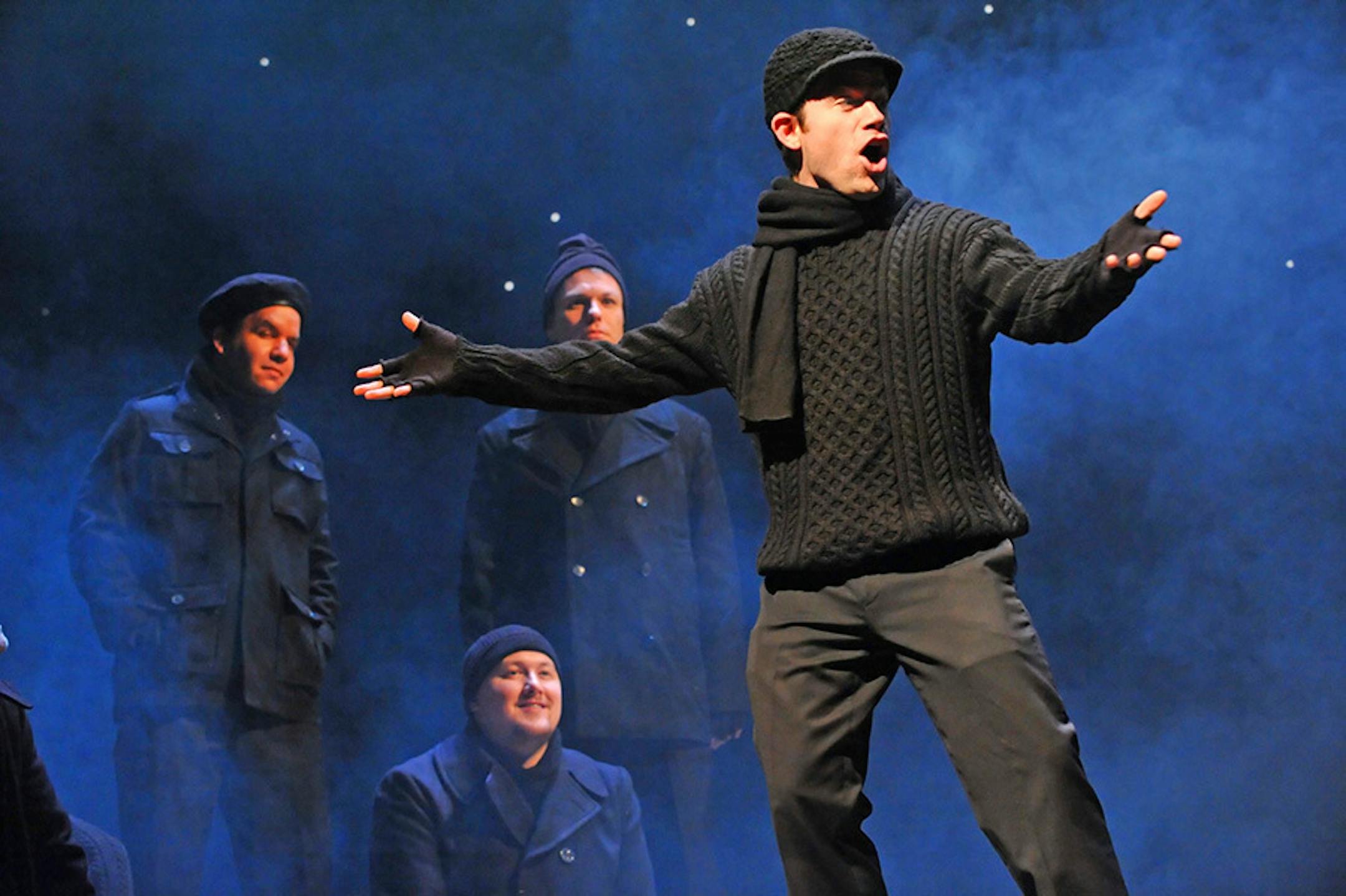 �ALL IS CALM: THE CHRISTMAS TRUCE OF 1914� in it's eighth year, Rothstein�s restaging of his own holiday classic �is indeed different. It is better. This small masterpiece has a unity and a vocal power that we had not experienced previously.� Cantus, Theater Latt� Da, and Hennepin Theater Trust present: "All is Calm: The Christmas Truce of 1914" By Peter Rothstein, with musical arrangements by Erick Lichte and Timothy C Takach Pantages Theater, Minneapolis, MN December 16-19, 2010 In foreground