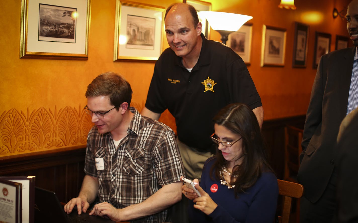 Hennepin County incumbent Sheriff Rich Stanek (in black) watched results come in at an election night party at Kip's Irish Pub in St. Louis Park, Minn., on Tuesday, November 4, 2014. ] RENEE JONES SCHNEIDER &#x2022; reneejones@startribune.com