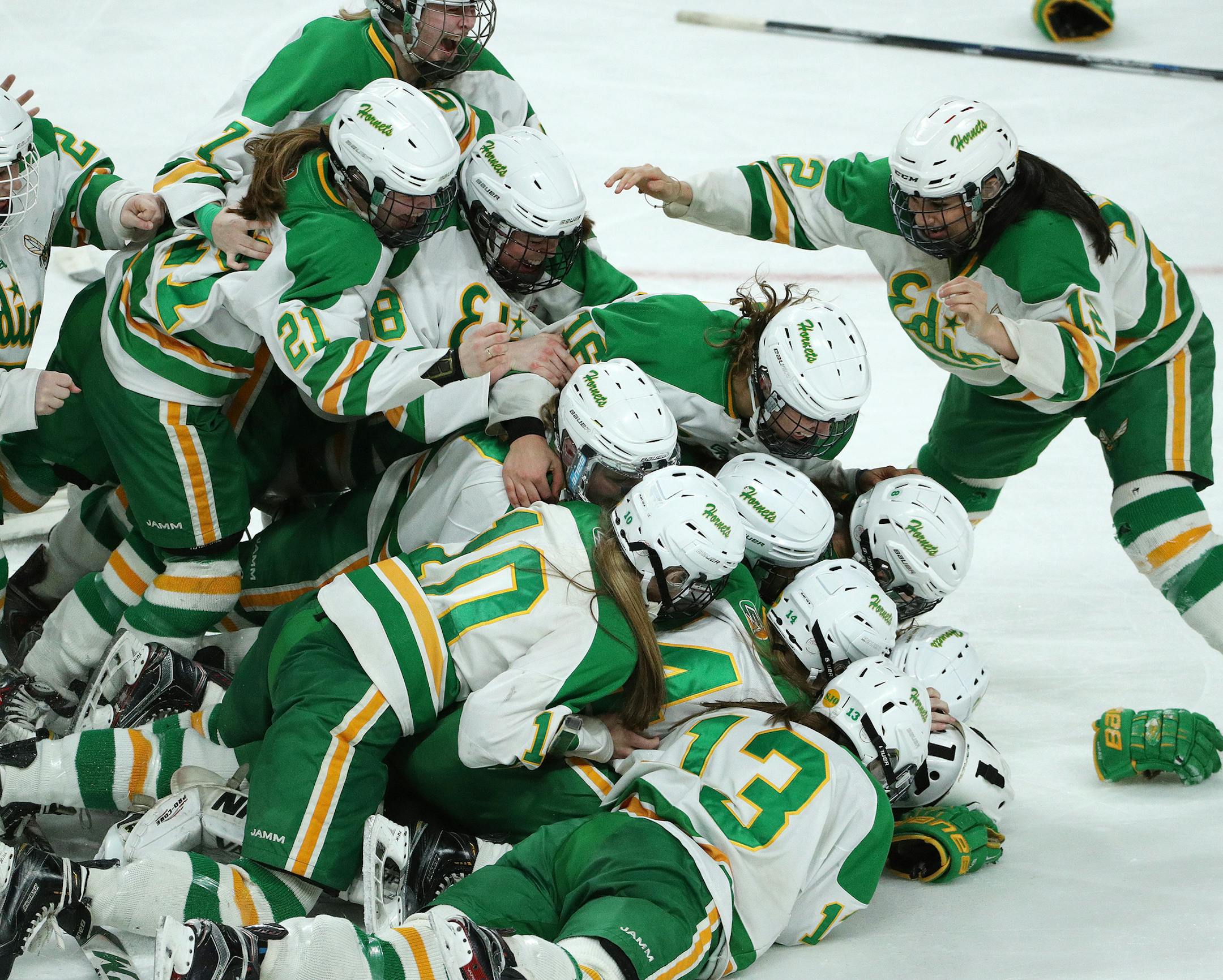 Edina goalkeeper Anna Goldstein (35) is mobbed by her teammates after the win. ] ANTHONY SOUFFLE &#xef; anthony.souffle@startribune.com Players competed in the Class 2A girls' hockey state championship Saturday, Feb. 25, 2017 at the Xcel Energy Center in St. Paul, Minn.