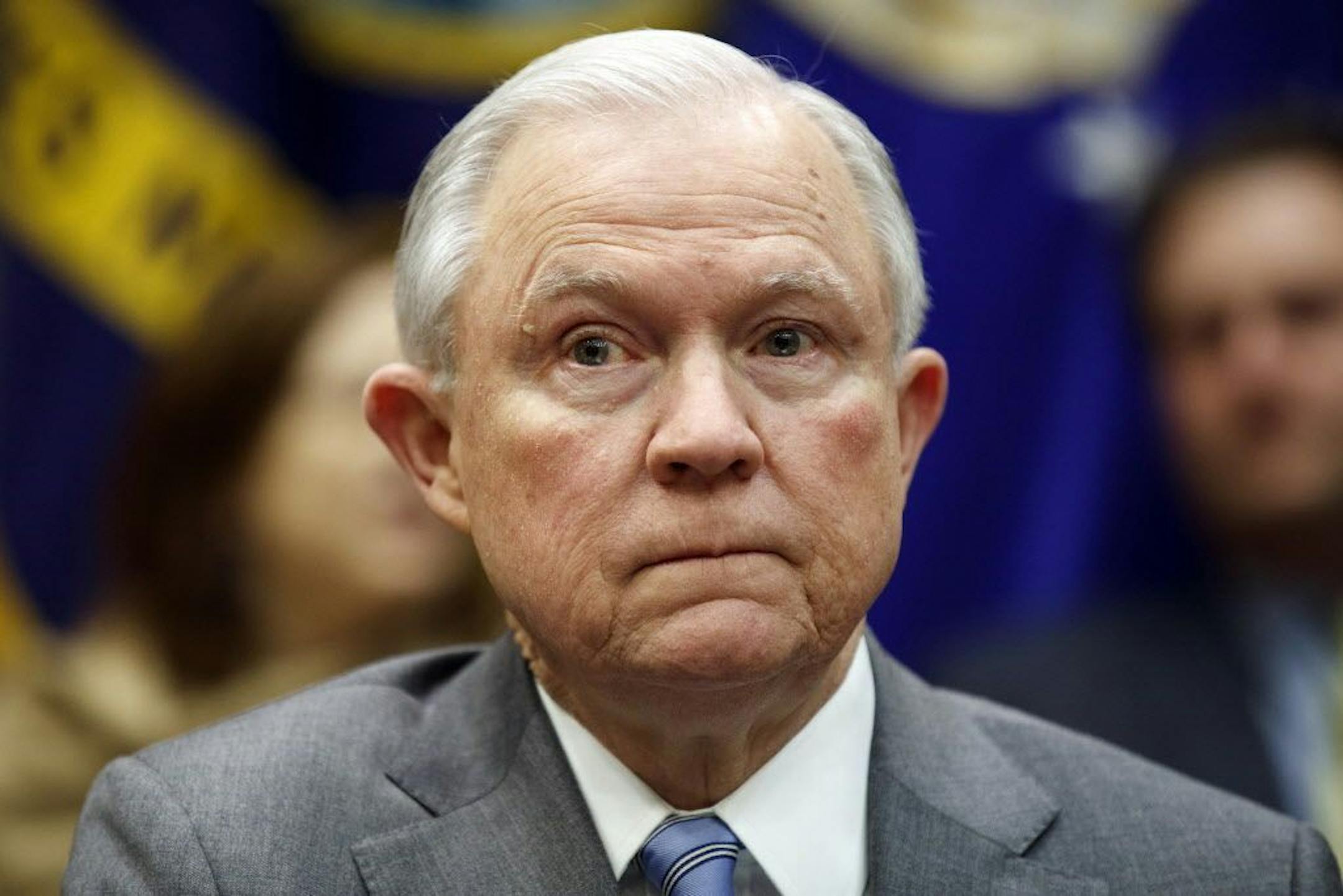 Attorney General Jeff Sessions listens during a meeting between President Donald Trump and state and local officials to discuss school safety in the Roosevelt Room of the White House, Thursday, Feb. 22, 2018, in Washington.