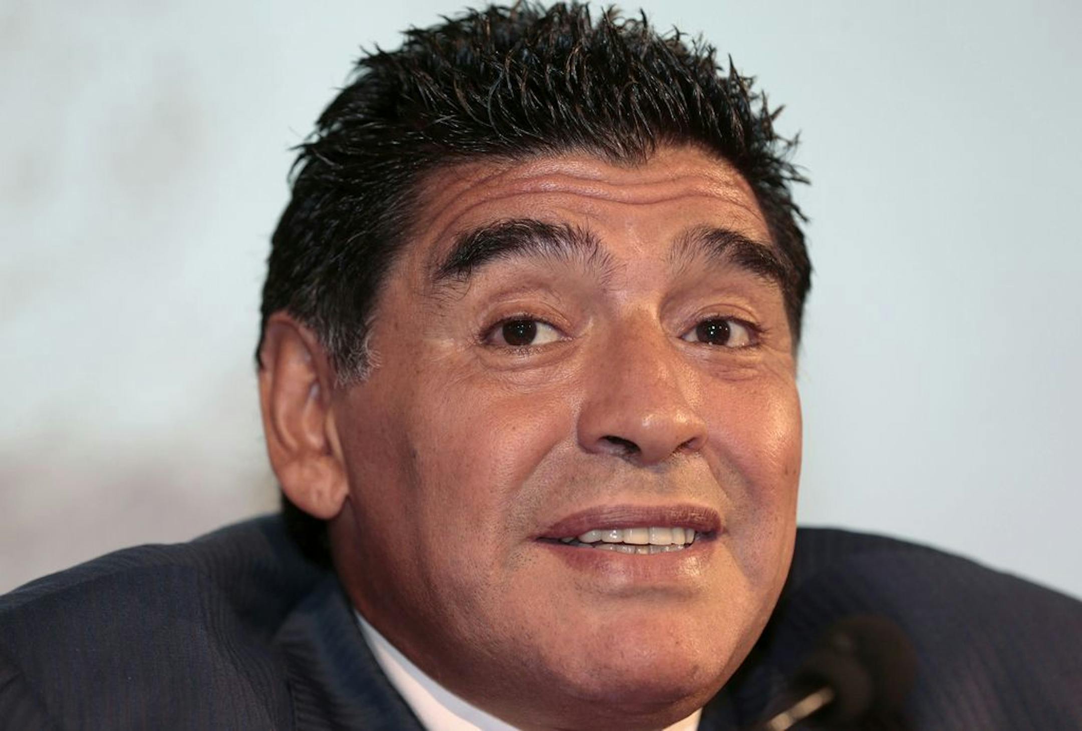 Diego Maradona meets the media in Milan, Italy, on Oct. 17, 2013.