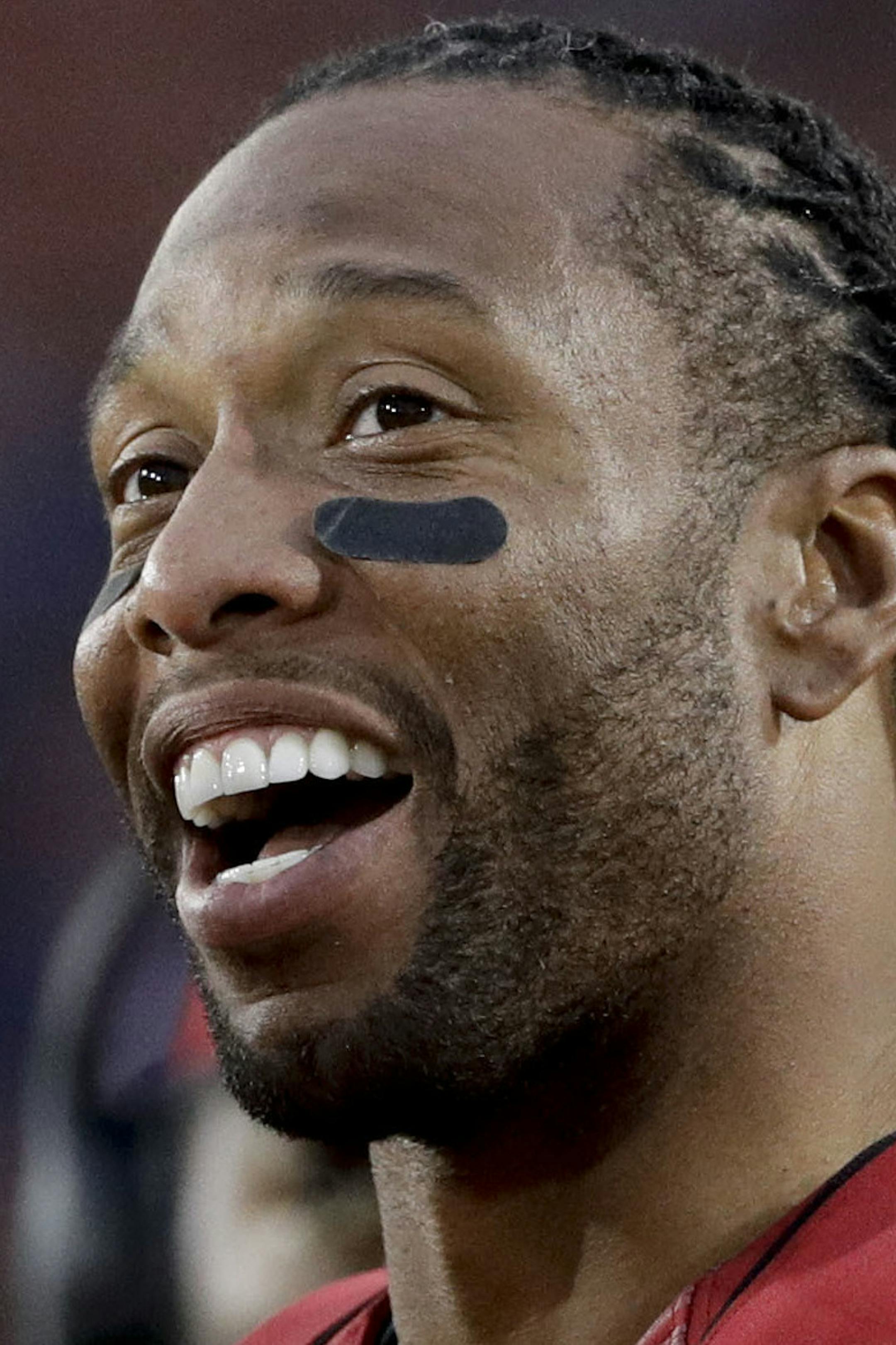 Arizona Cardinals wide receiver Larry Fitzgerald smiles during the second half of an NFL football game against the Los Angeles Rams Sunday, Jan. 1, 2017, in Los Angeles. (AP Photo/Jae C. Hong)