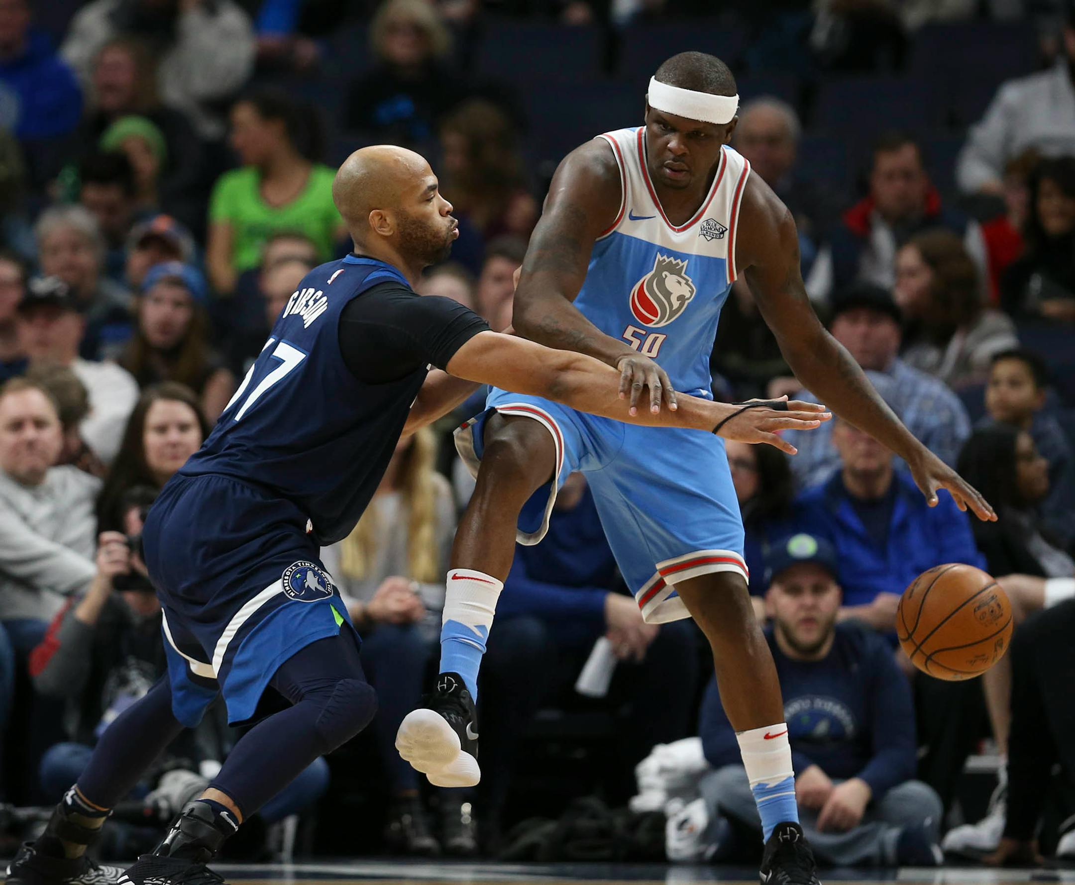 Minnesota Timberwolves forward Taj Gibson guarded Sacramento Kings forward Zach Randolph (50) closely in the second quarter.