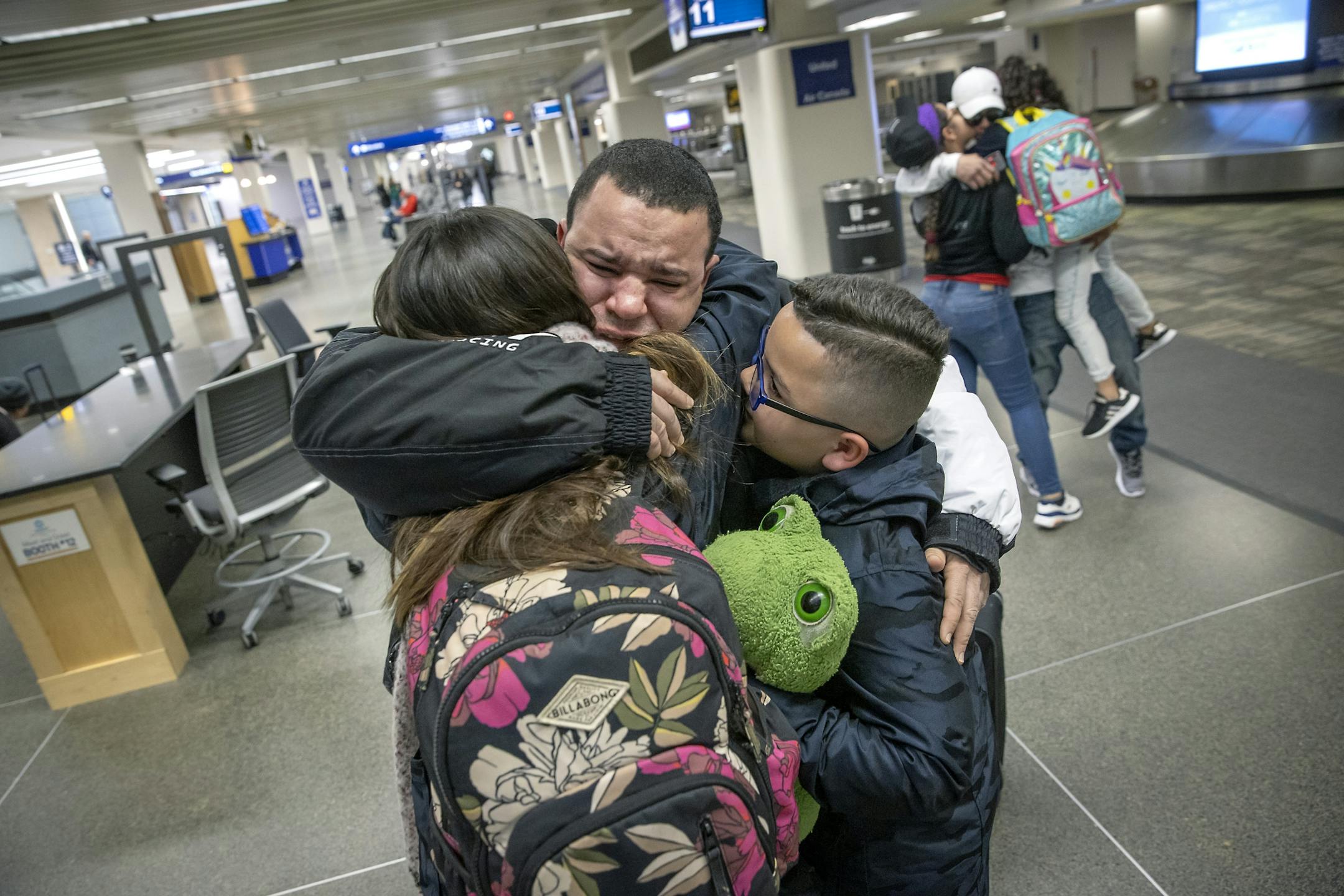 Christopher Roca, who currently works the overnight sift at Polaris, tearfully greeted his children Cristina Zoe Roca, left, and Christopher Julián Roca, as they arrived at Minneapolis-St. Paul International Airport from San Juan, Puerto Rico, Saturday, February 29, 2020 in Bloomington, MN.