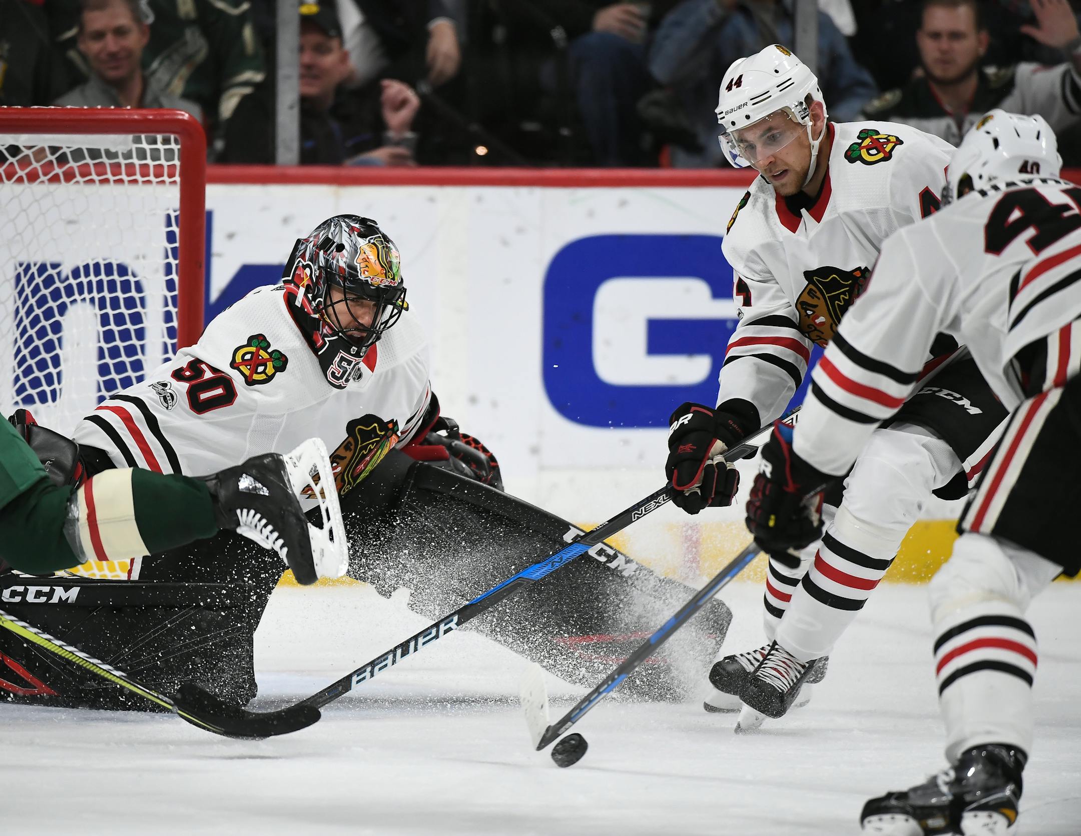 Chicago Blackhawks goalie Corey Crawford (50) eyed the puck as defenseman Jan Rutta (44) defended the crease in the second period. ] AARON LAVINSKY • aaron.lavinsky@startribune.com The Minnesota Wild played the Chicago Blackhawks on Saturday, Nov. 4, 2017 at Xcel Energy Center in St. Paul, Minn.