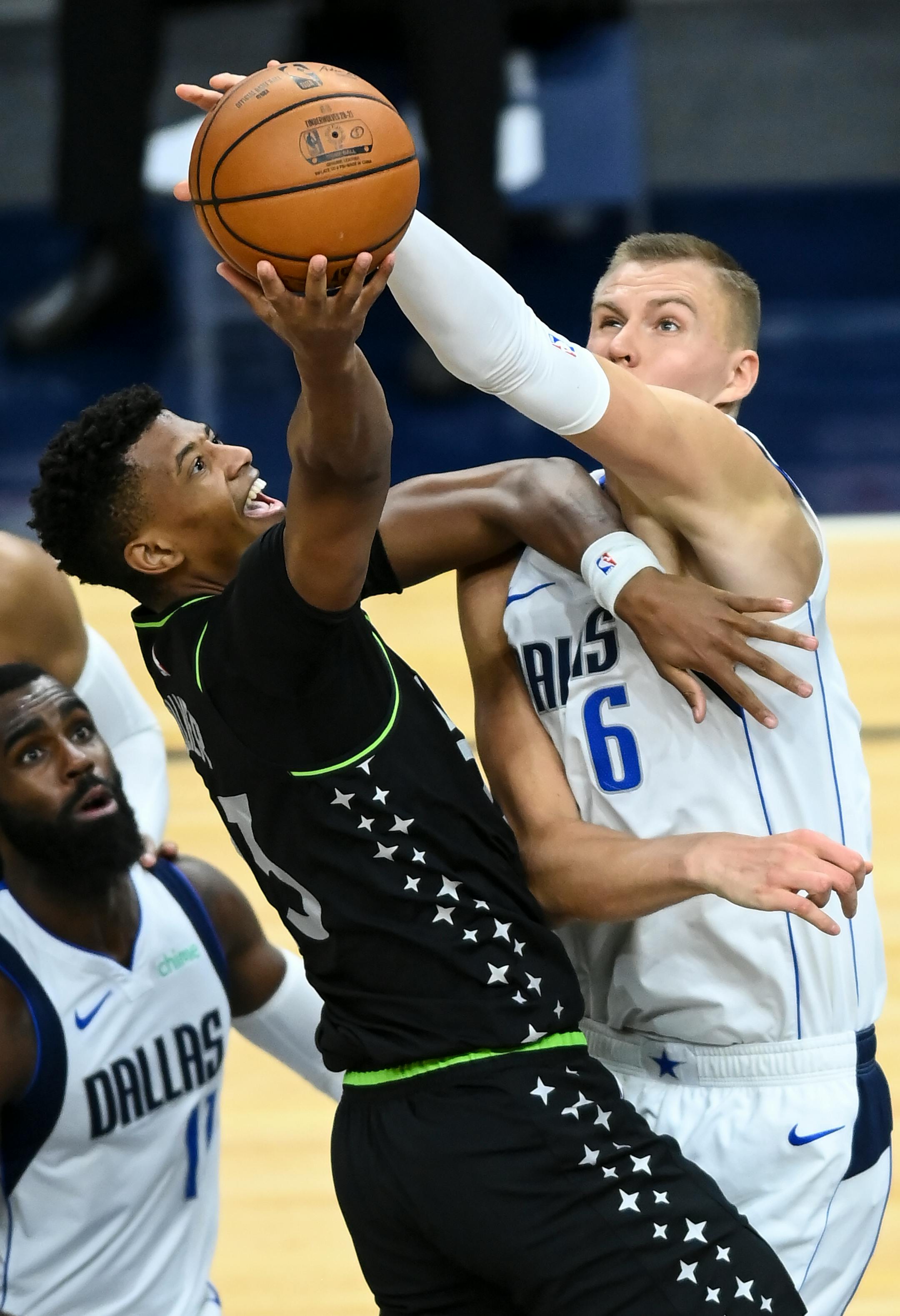 Dallas Mavericks center Kristaps Porzingis (6) blocked a shot by Minnesota Timberwolves forward Jarrett Culver (23) in the second quarter.