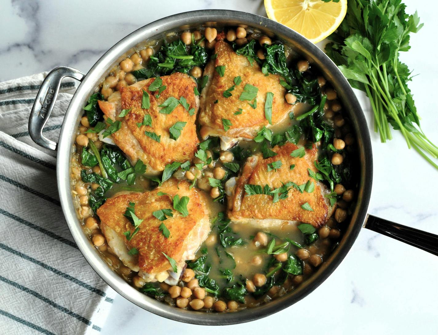 Lemon Garlic-Braised Chicken Thighs with Chickpeas and Spinach is a braise that makes easy work come mealtime. Recipe and photo by Meredith Deeds, Special to the Star Tribune.