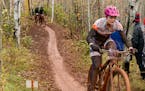 Stillwater senior Lily Ward races at the Minnesota Cycling Association’s All Team Finale at Redhead Mountain Bike Park in Chisholm, Minn.