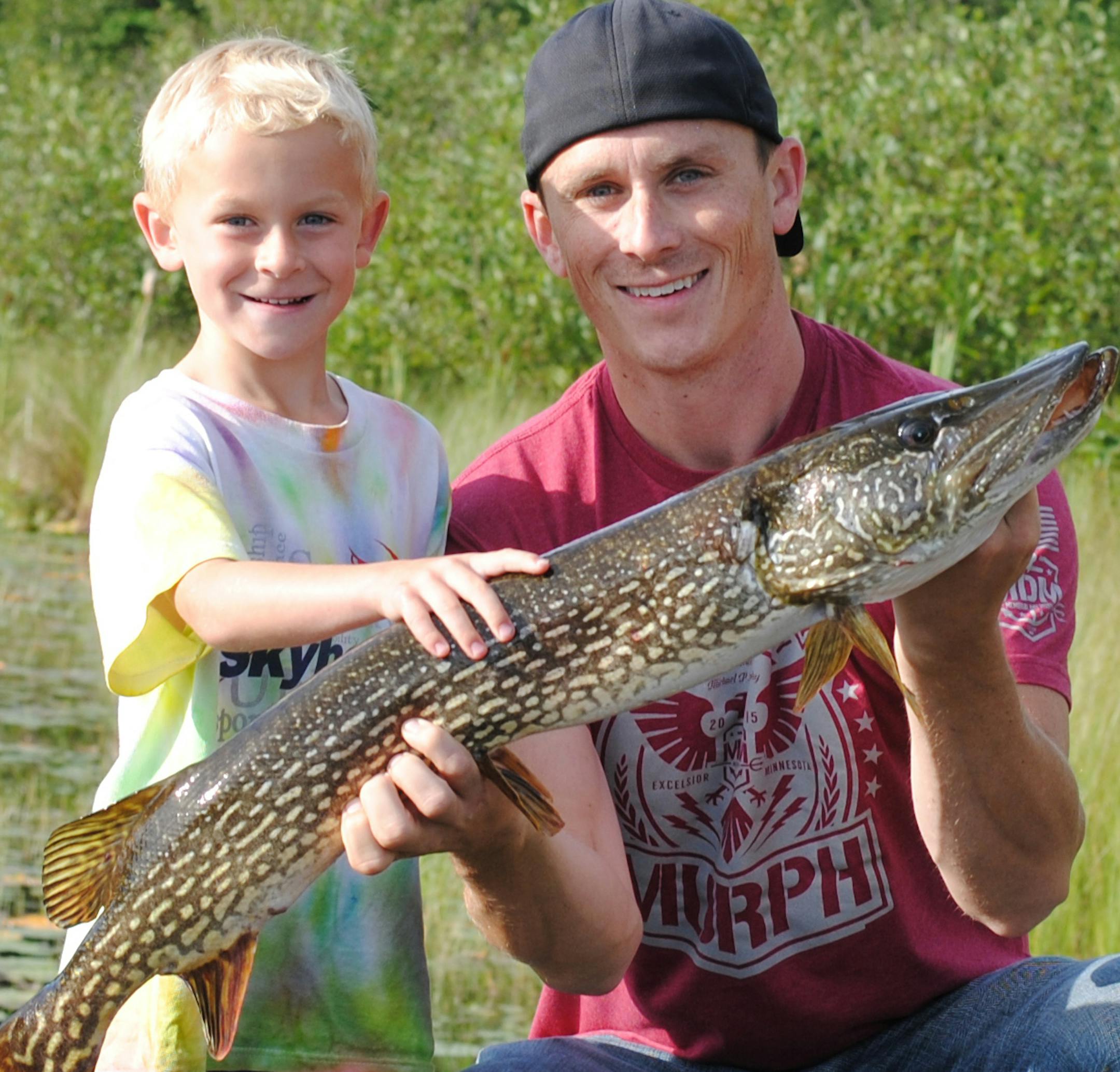 CABIN LIFE JJ Brackin, 6, of Minnetonka caught this 37-inch, 12-pound northern on Mary Lake near Big Fork. He already had landed 28- and 29-inch northerns when the bigger fish hit. "His head was so huge!'' JJ said. His dad, James, netted the fish. JJ later caught a 14-inch crappie -- and then told his parents he wanted to move to the cabin.