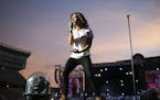 Harry Styles of One Direcction as they sang "Little Black Dress" early in their set Sunday night at TCF Bank Stadium.