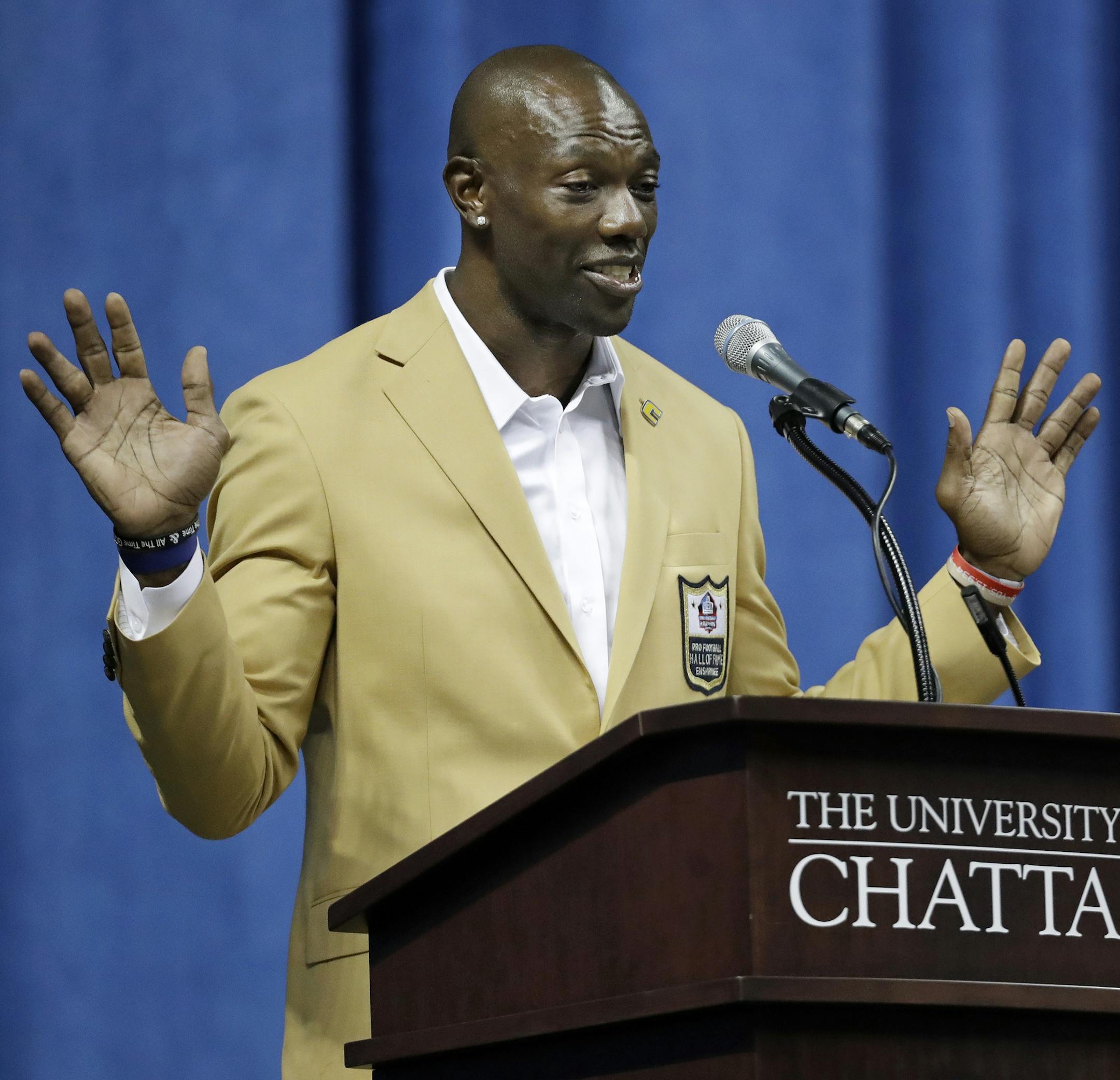 Former wide receiver Terrell Owens delivers his NFL Pro Football Hall of Fame speech on Saturday, Aug. 4, 2018, in Chattanooga, Tenn. Instead of speaking at the Hall of Fame festivities in Canton, Ohio, Owens celebrated his induction at the University of Tennessee at Chattanooga, where he played football and basketball and ran track. (AP Photo/Mark Humphrey)