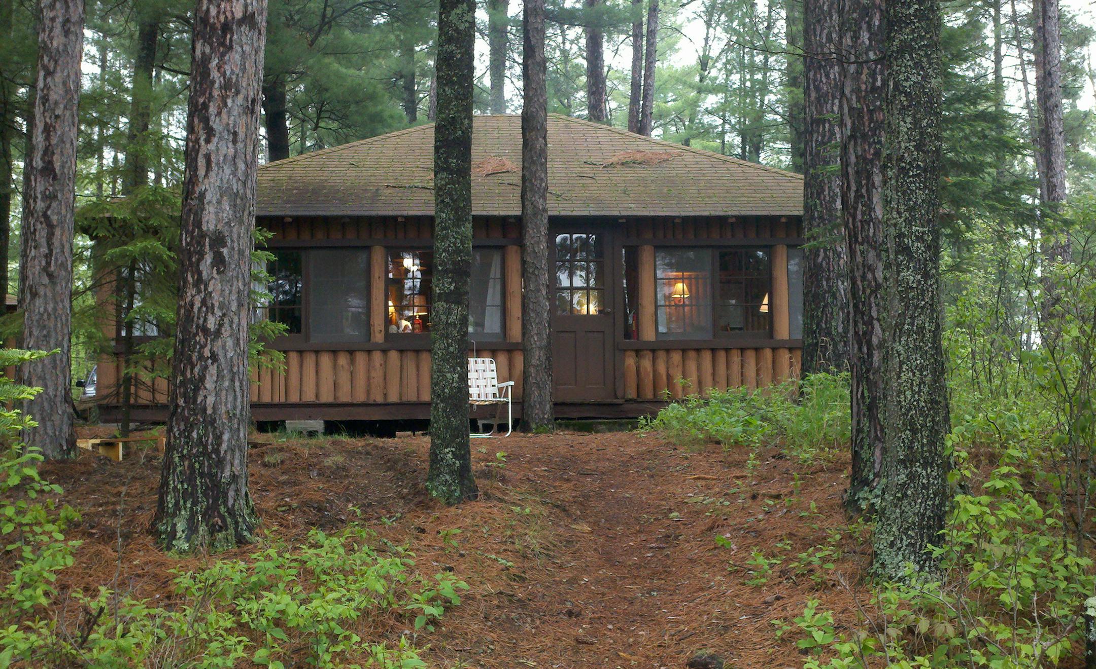 The cabin with the vertical logs -- Finnish-style -- sits near Two Harbors in the Superior National Forest.